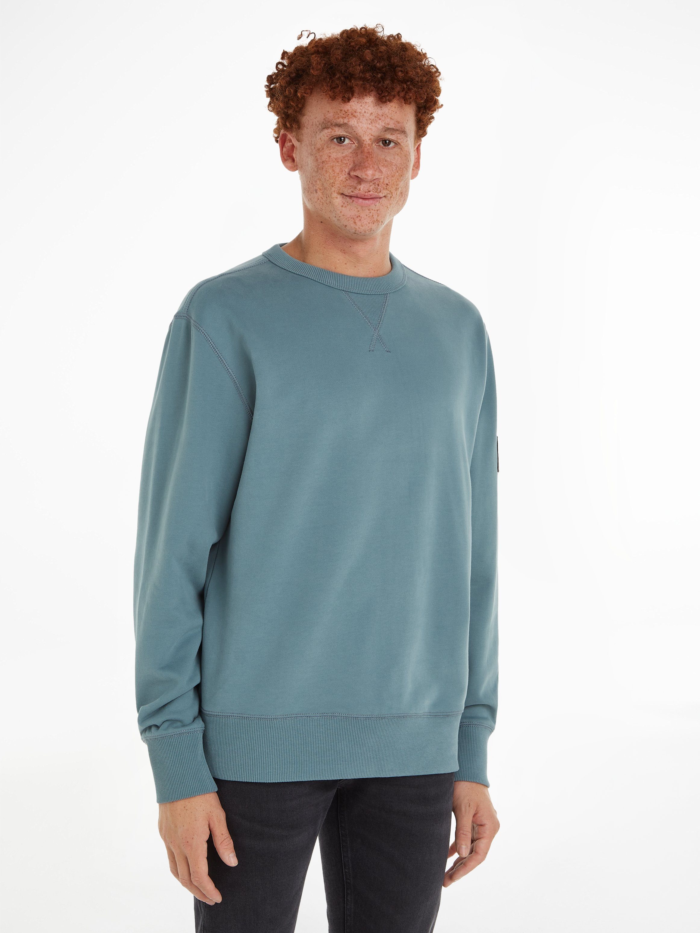 Calvin Klein Jeans Sweatshirt BADGE CREW NECK mit Logopatch Goblin Blue