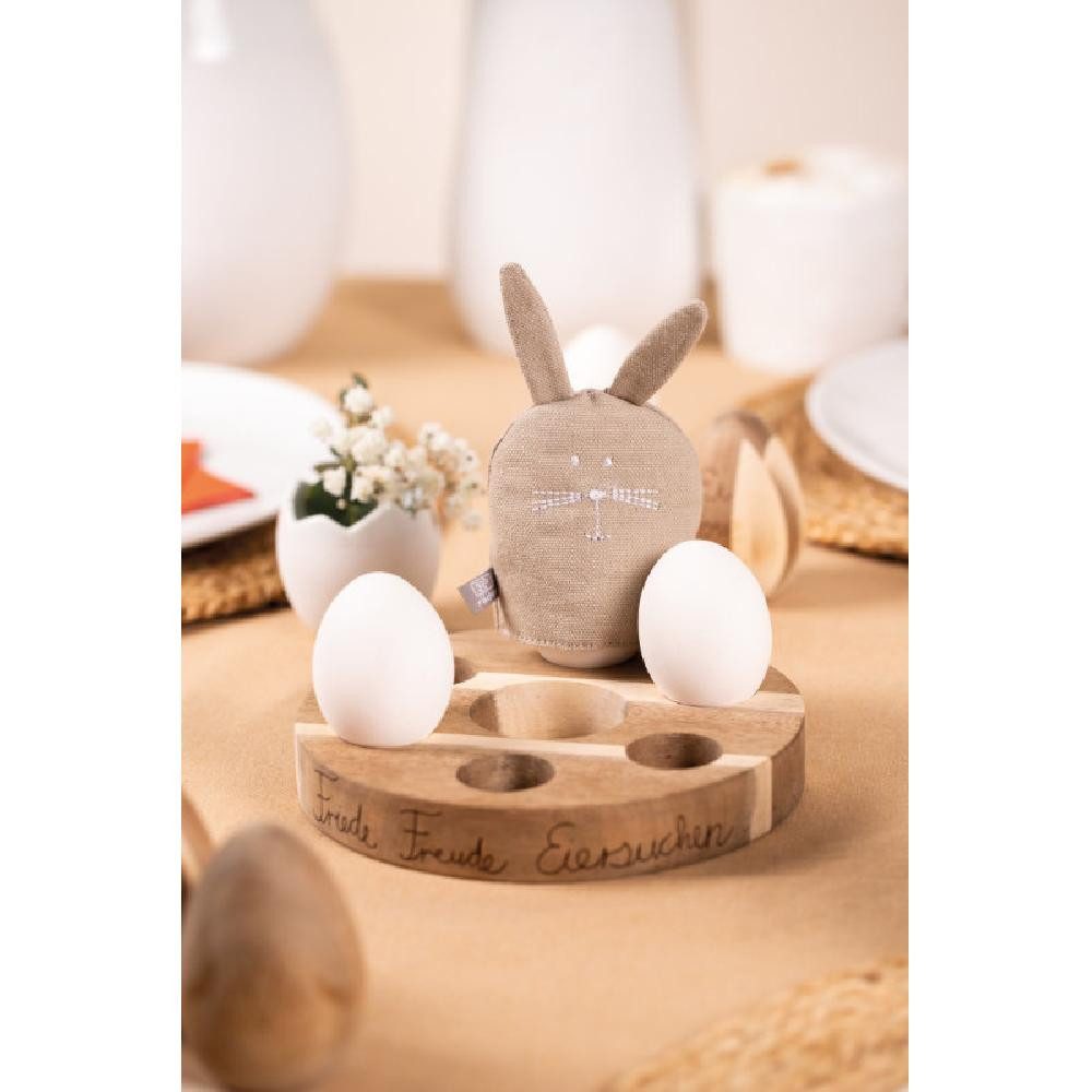 Räder Osterfigur Design Eierwärmer Häschen