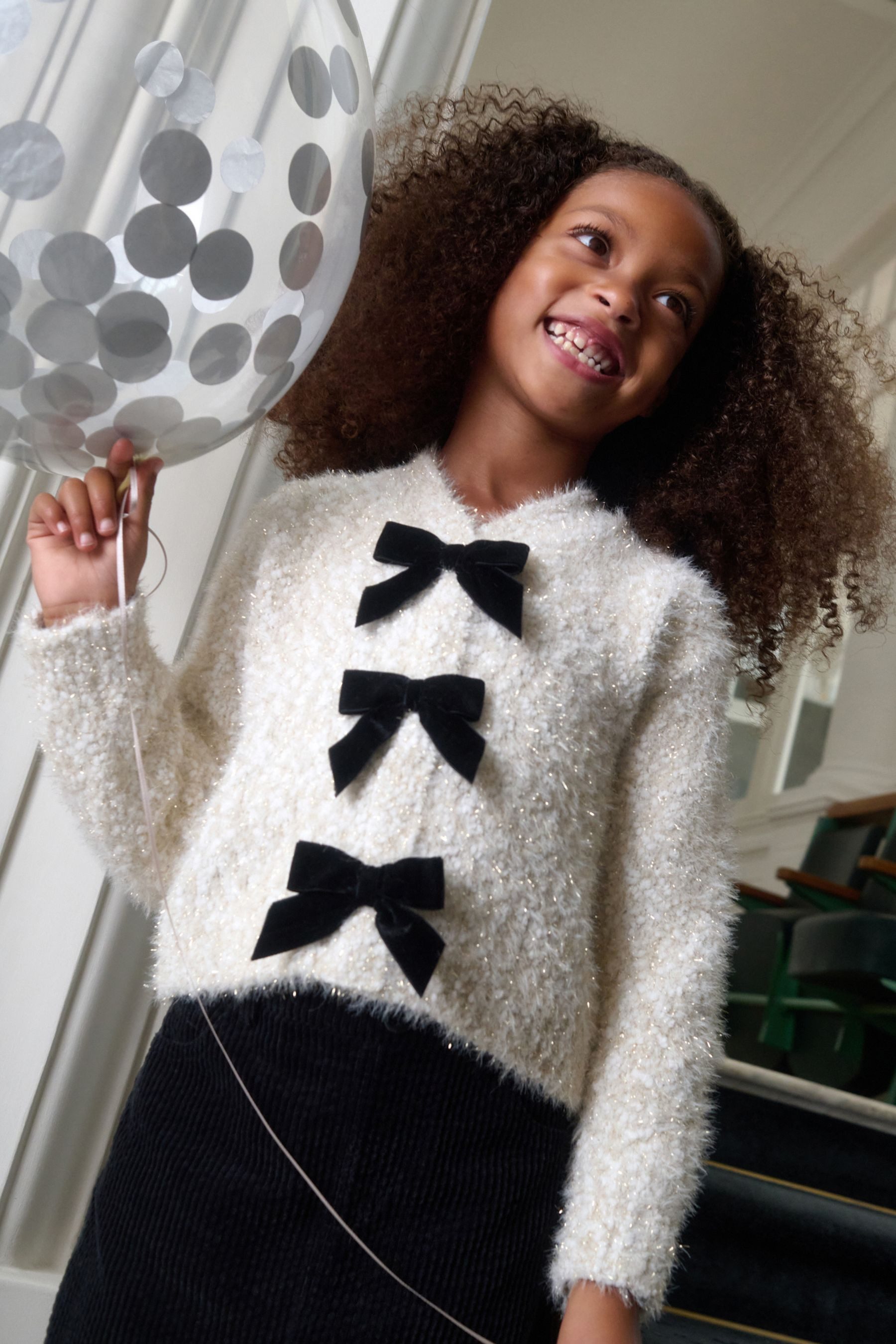 Strickjacke Strickjacke mit V-Ausschnitt und Schleife