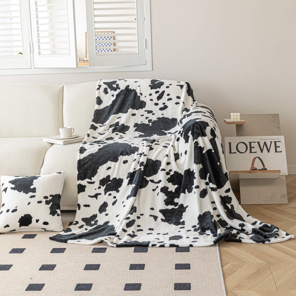Wolldecke Kuh Muster / Kuscheldecke / günstig online kaufen