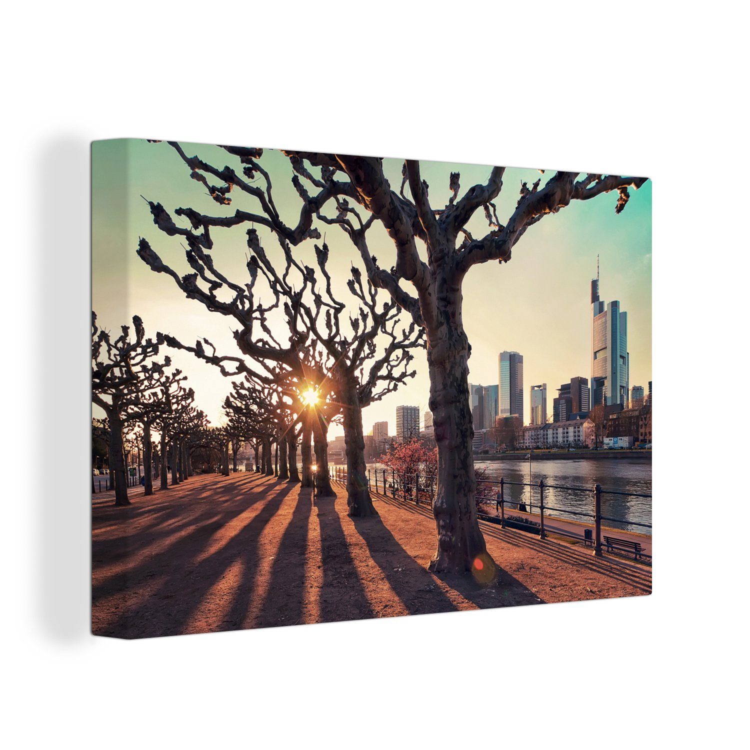 OneMillionCanvasses® Leinwandbild Sonnenuntergang zwischen den Bäumen in Frankfurt am Main, (1 St), Wandbild Leinwandbilder, Aufhängefertig, Wanddeko, 30x20 cm