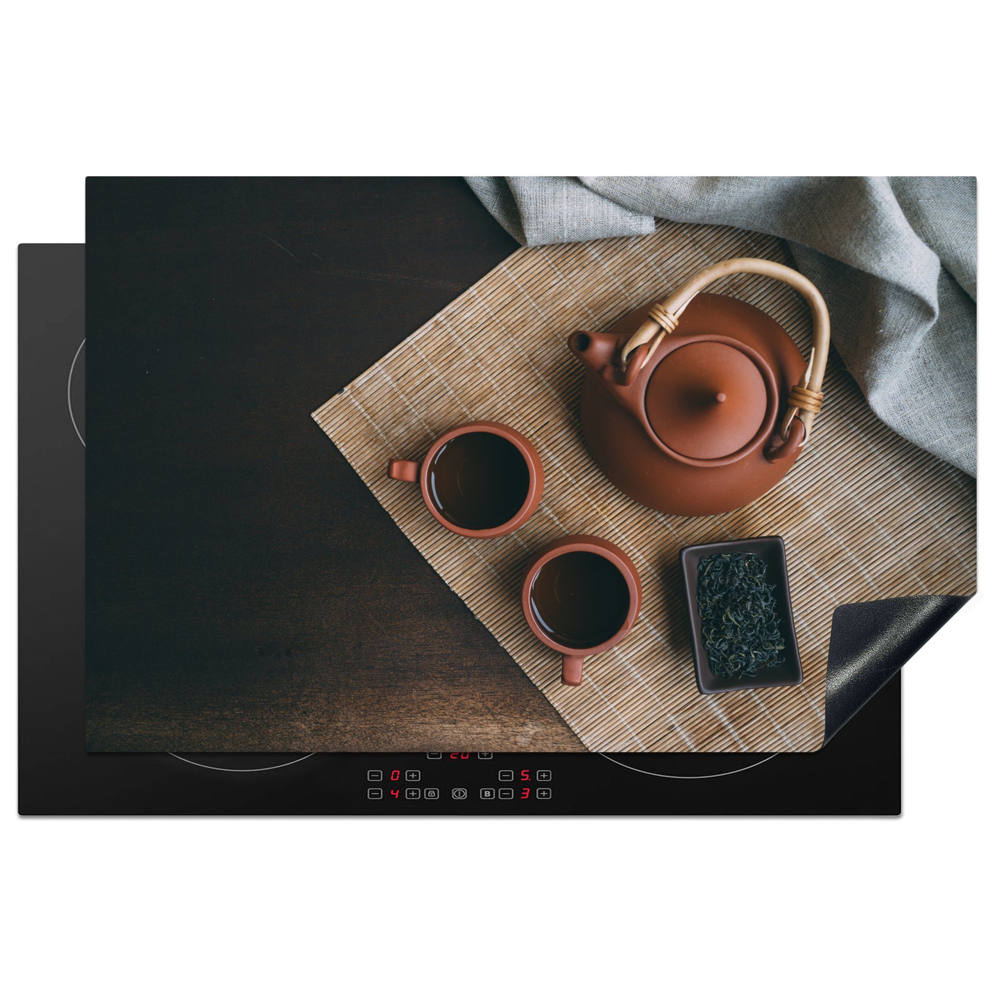 MuchoWow Herdblende-/Abdeckplatte Draufsicht auf zwei Teetassen mit braunem Wasser, Vinyl, (1 tlg), 81x52 cm, Induktionskochfeld Schutz für die küche, Ceranfeldabdeckung