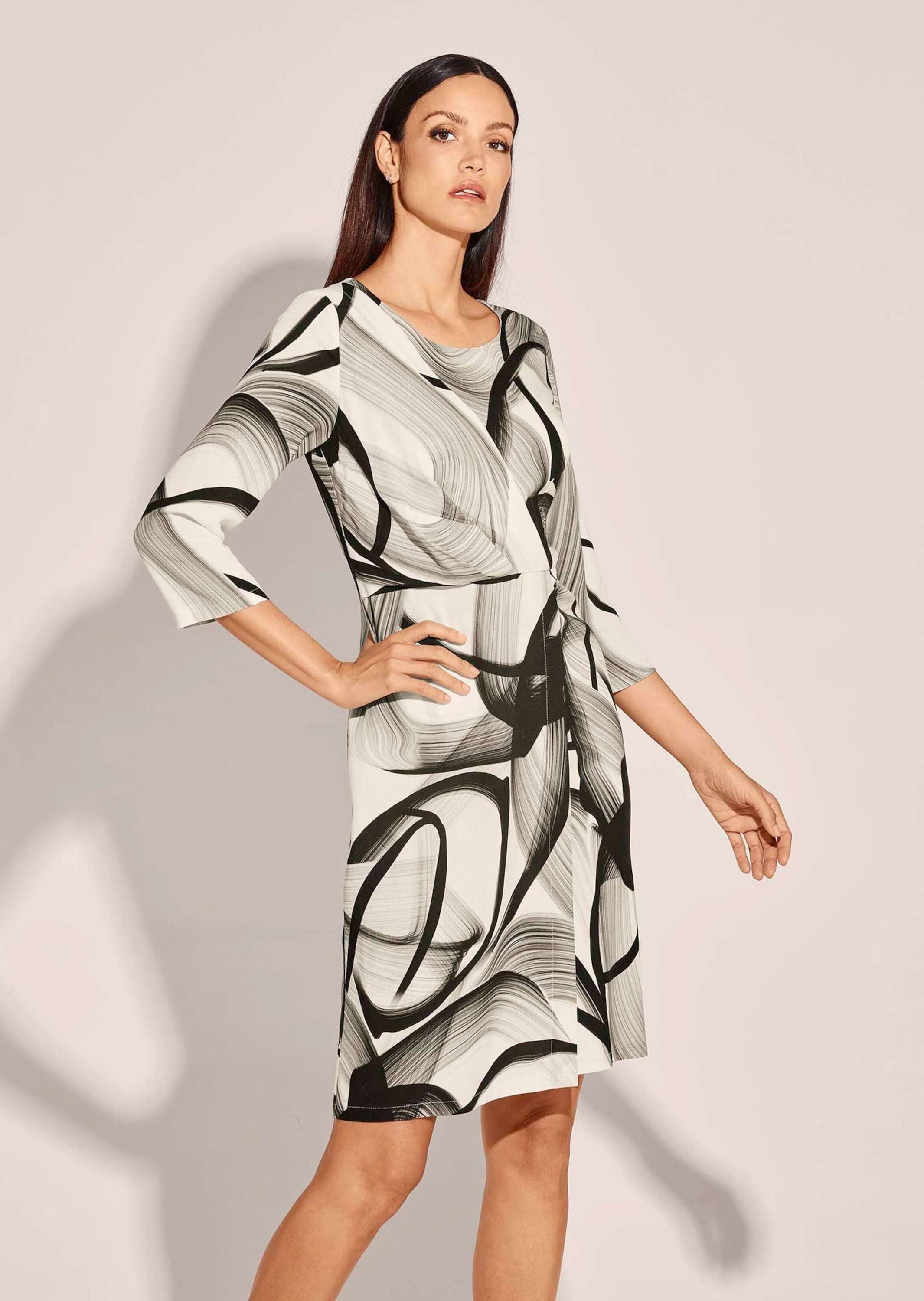 MADELEINE Midikleid Kleid in raffinierter Wickel-Optik mit Grafikprint günstig online kaufen