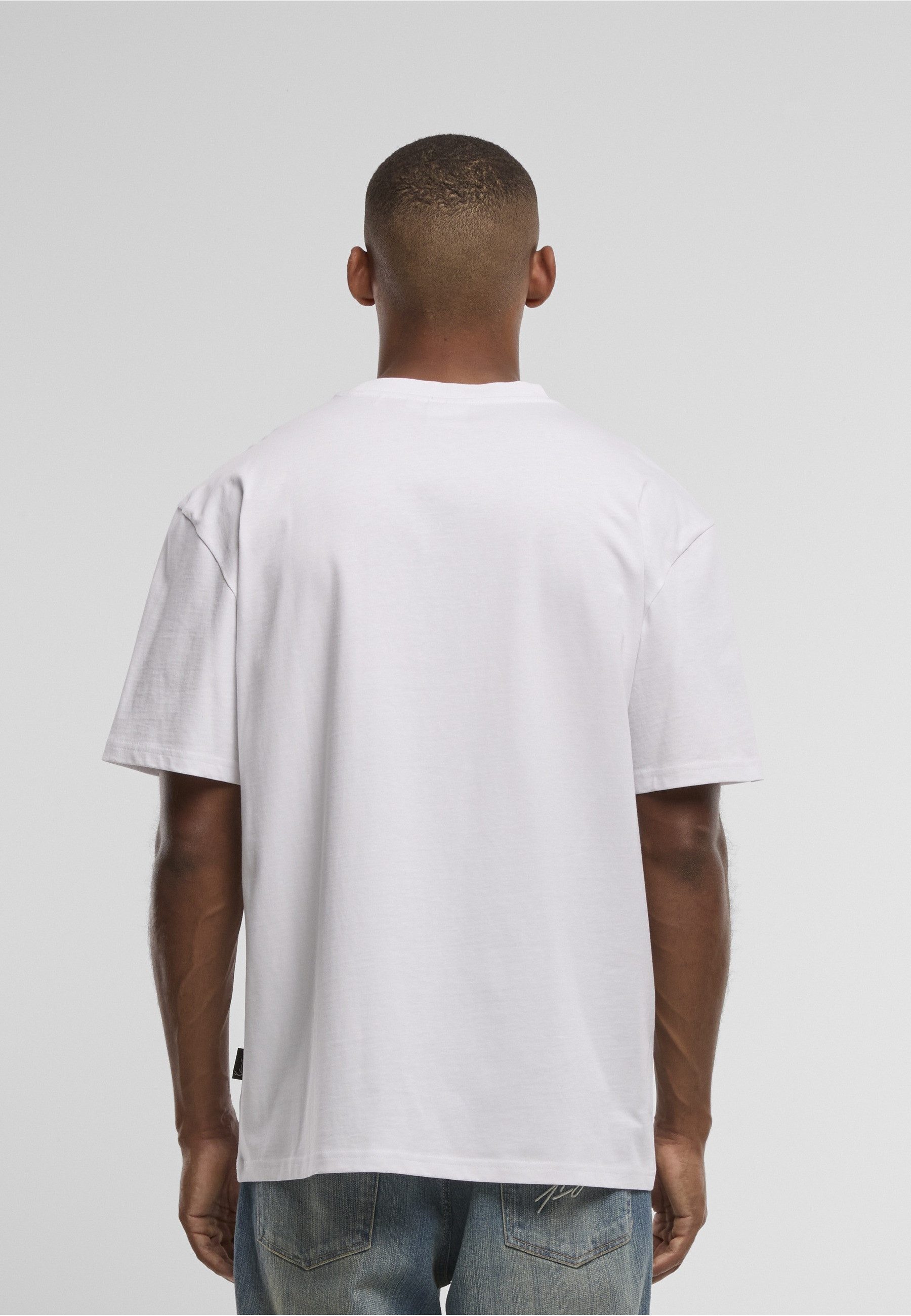 Karl Kani T-Shirt Karl Kani Woven Signature Collaboration Oversized T-Shirt (1-tlg) – Bild 4 von 5