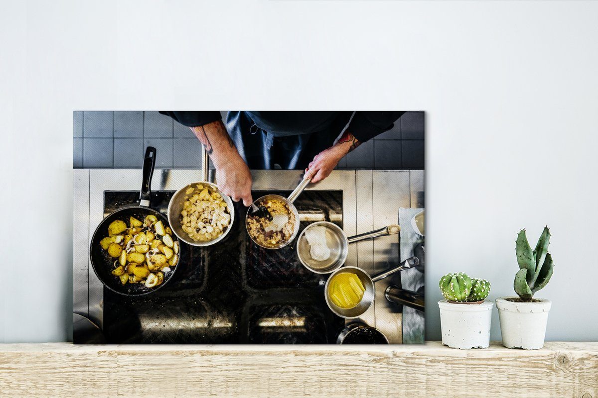 Ein 30x20 Leinwandbilder, Aufhängefertig, Restaurant St), in Wandbild einem kocht, der (1 cm OneMillionCanvasses® Koch, Wanddeko, Leinwandbild