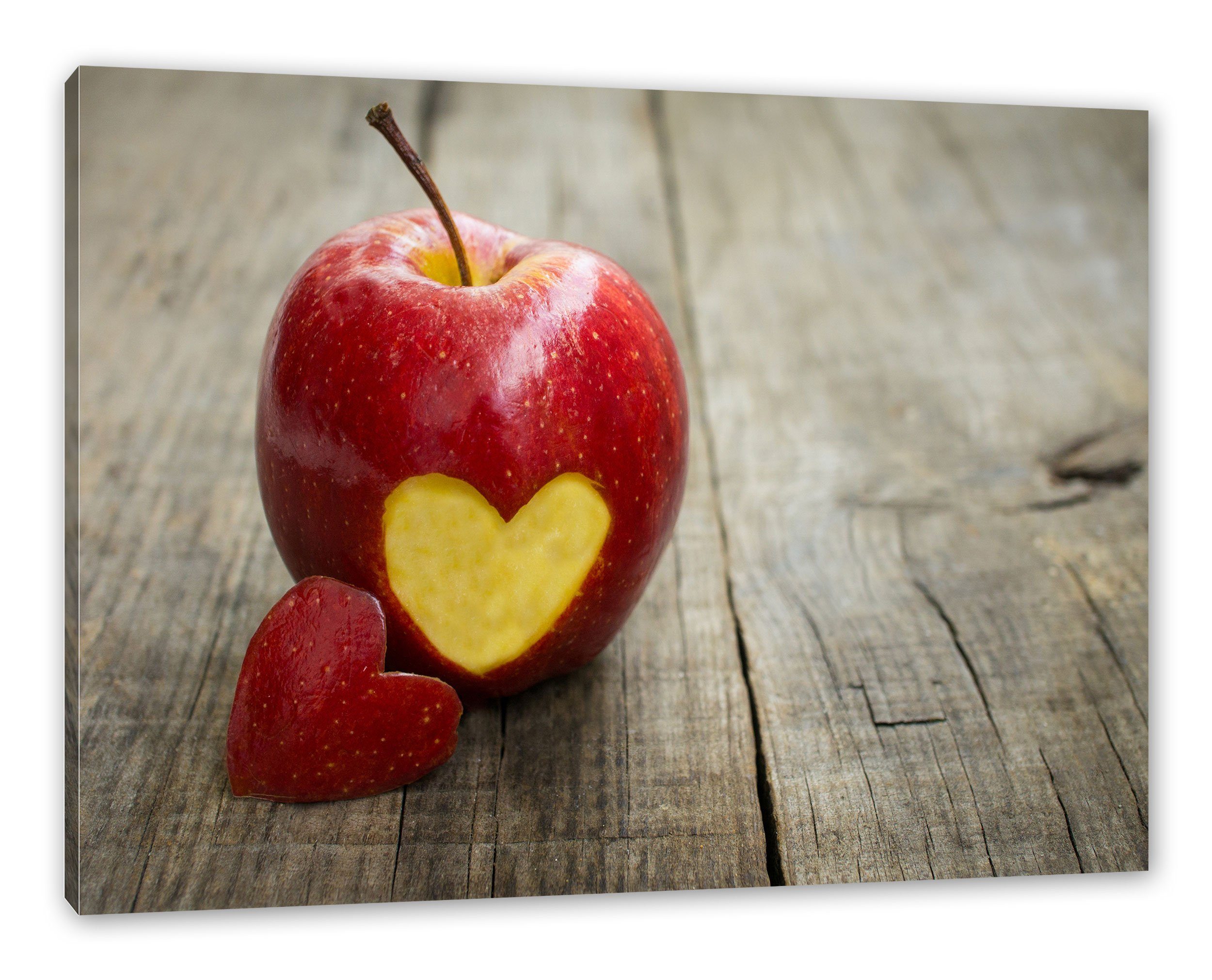 Pixxprint Leinwandbild Herzschnitzerei in Apfel, Herzschnitzerei in Apfel (1 St), Leinwandbild fertig bespannt, inkl. Zackenaufhänger