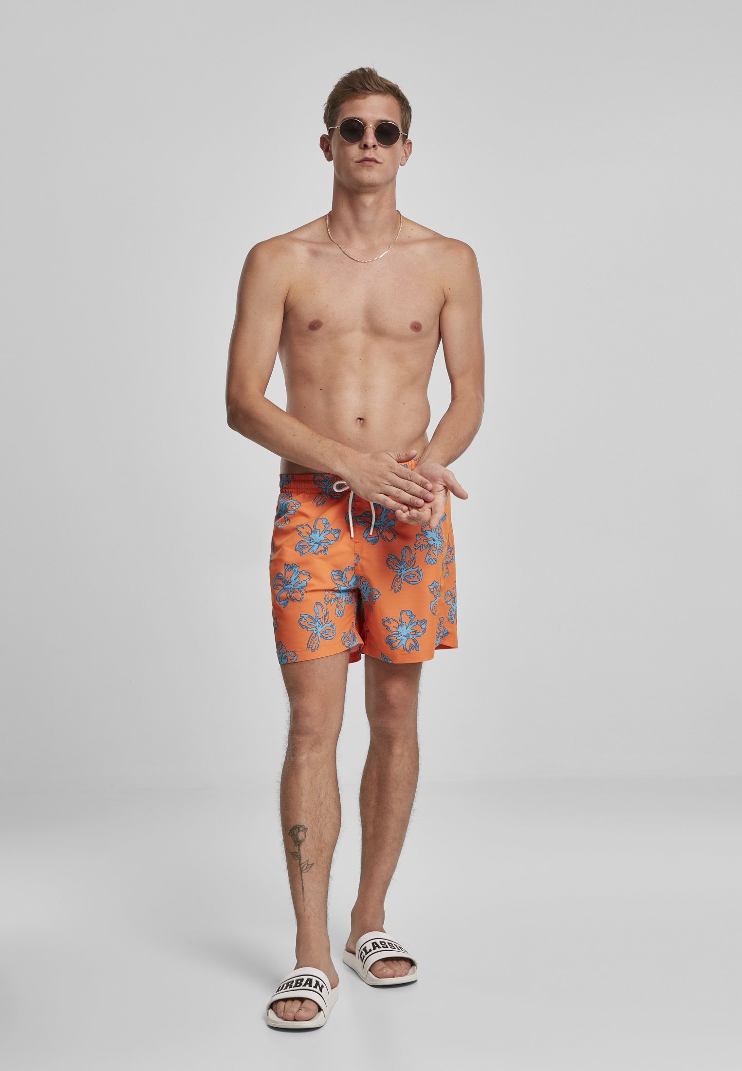 URBAN CLASSICS Badeshorts orange Floral Herren Swim Shorts