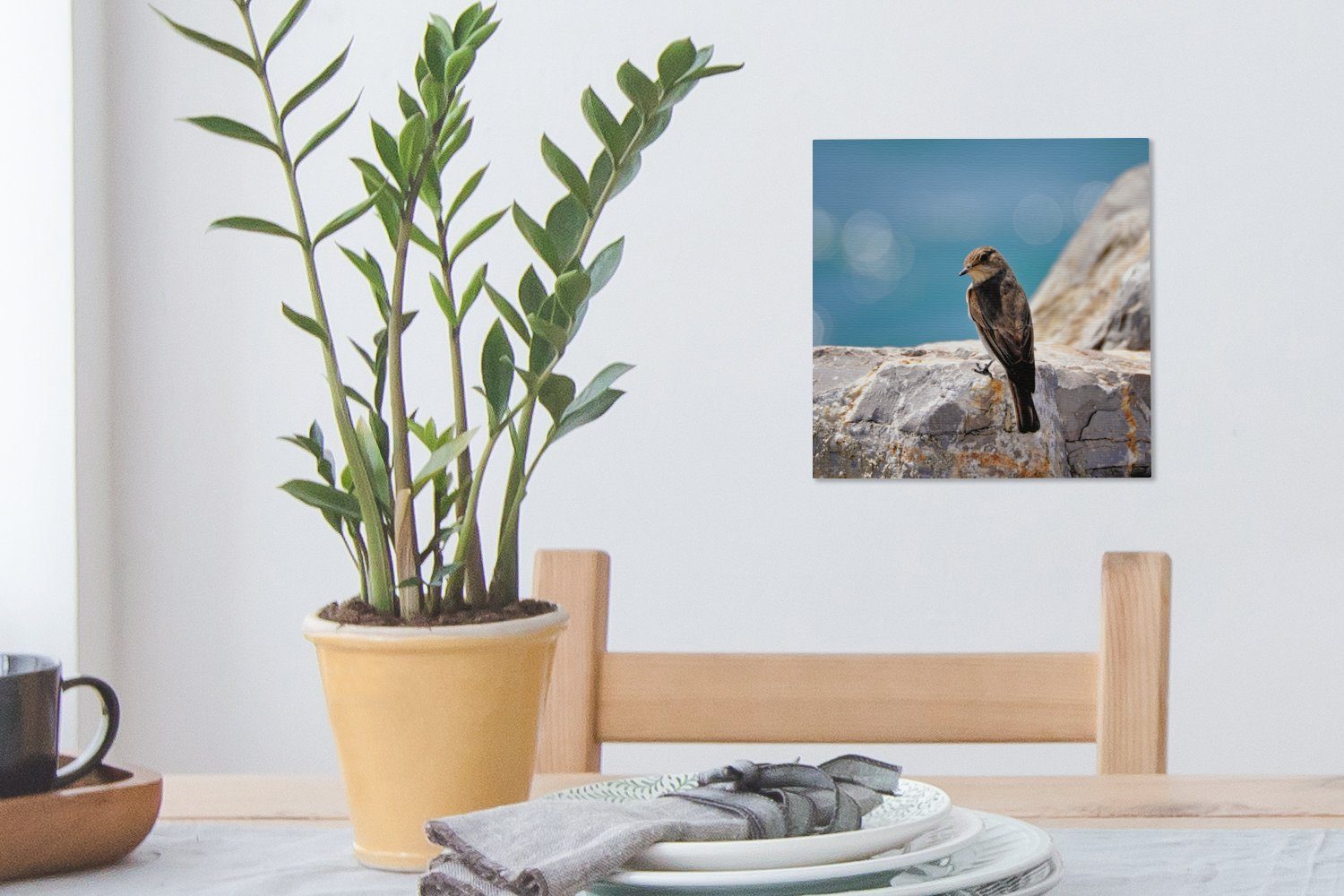 Wohnzimmer Leinwandbild Schlafzimmer (1 St), Bilder Steinsperling einem Meer, am OneMillionCanvasses® Felsen Leinwand auf für