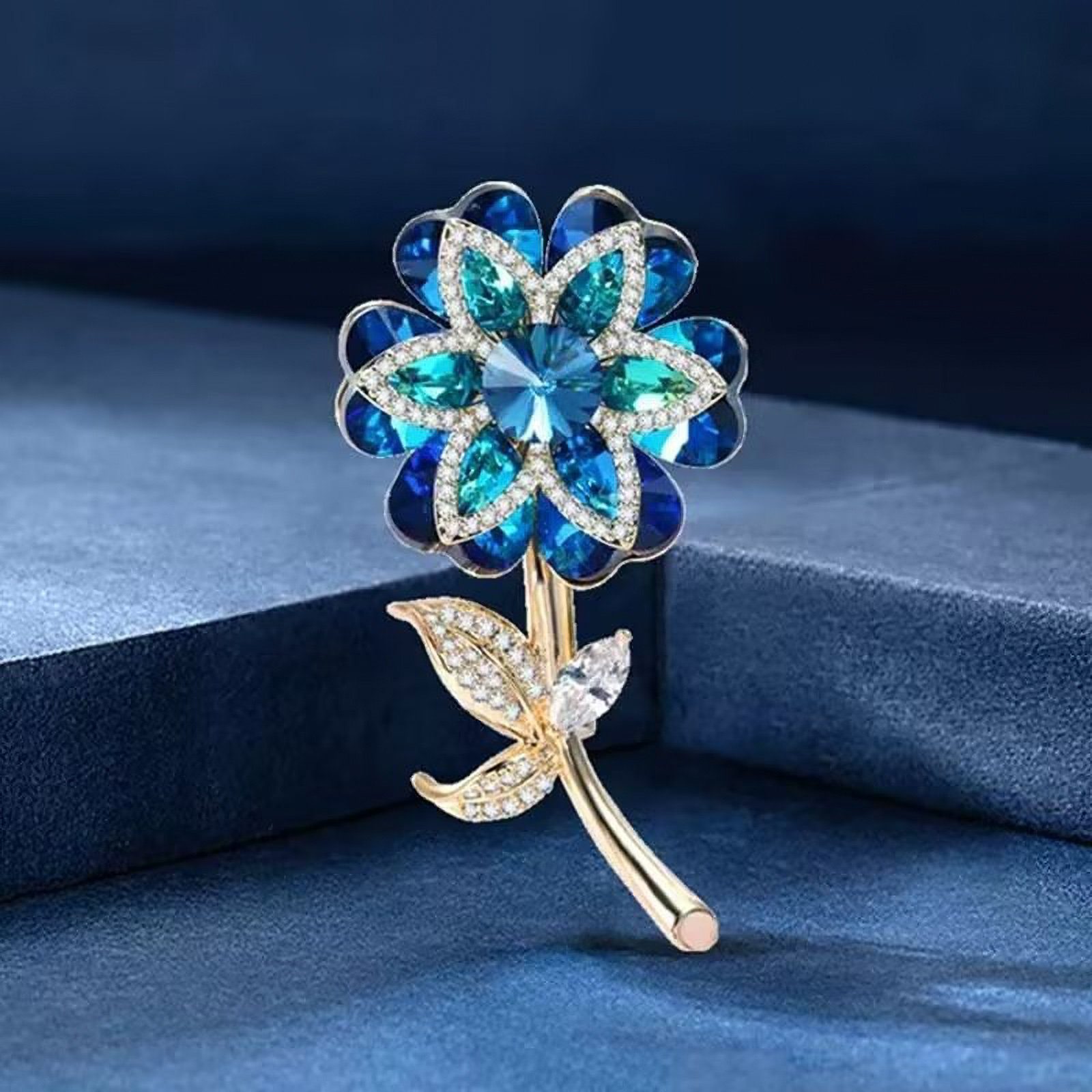 MayTree Brosche Form türkisen einer Glassteinen - Metallbrosche blauen mit "seltene Blüte", blau (1-tlg), Strass-Steinen Blüte in aus
