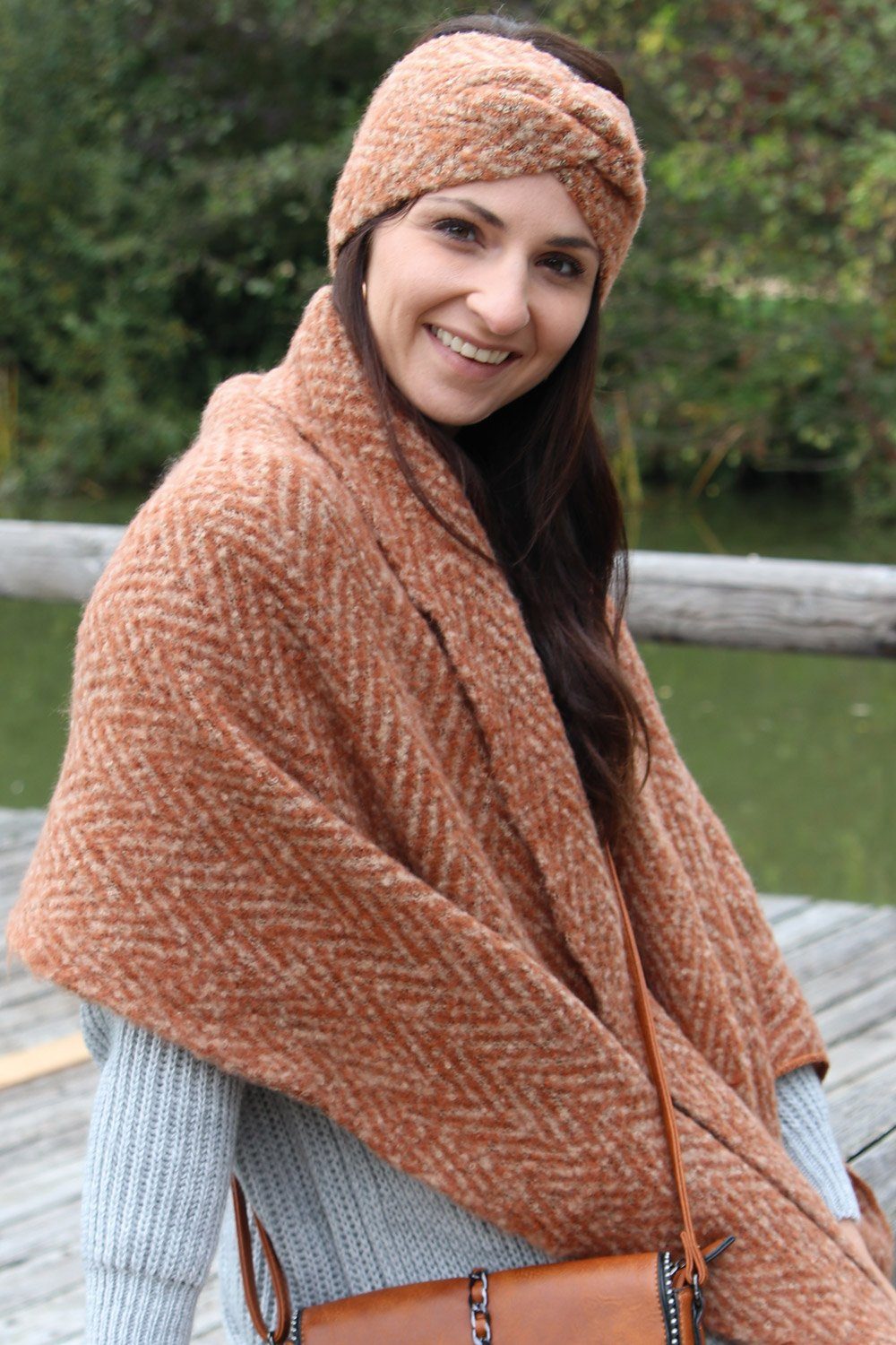 styleBREAKER Stirnband Web Stirnband mit Zacken Muster und Twist Knoten (1-St)