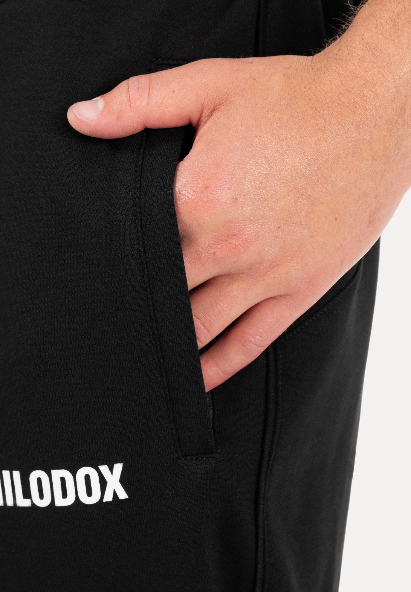 Smilodox Jogginghose Denzo Herren, Regular Fit Jogger, Trainingshose für Gym & Freizeit Rippbündchen, Taschen mit Reiverschluss, Kordelzug, Streetwear