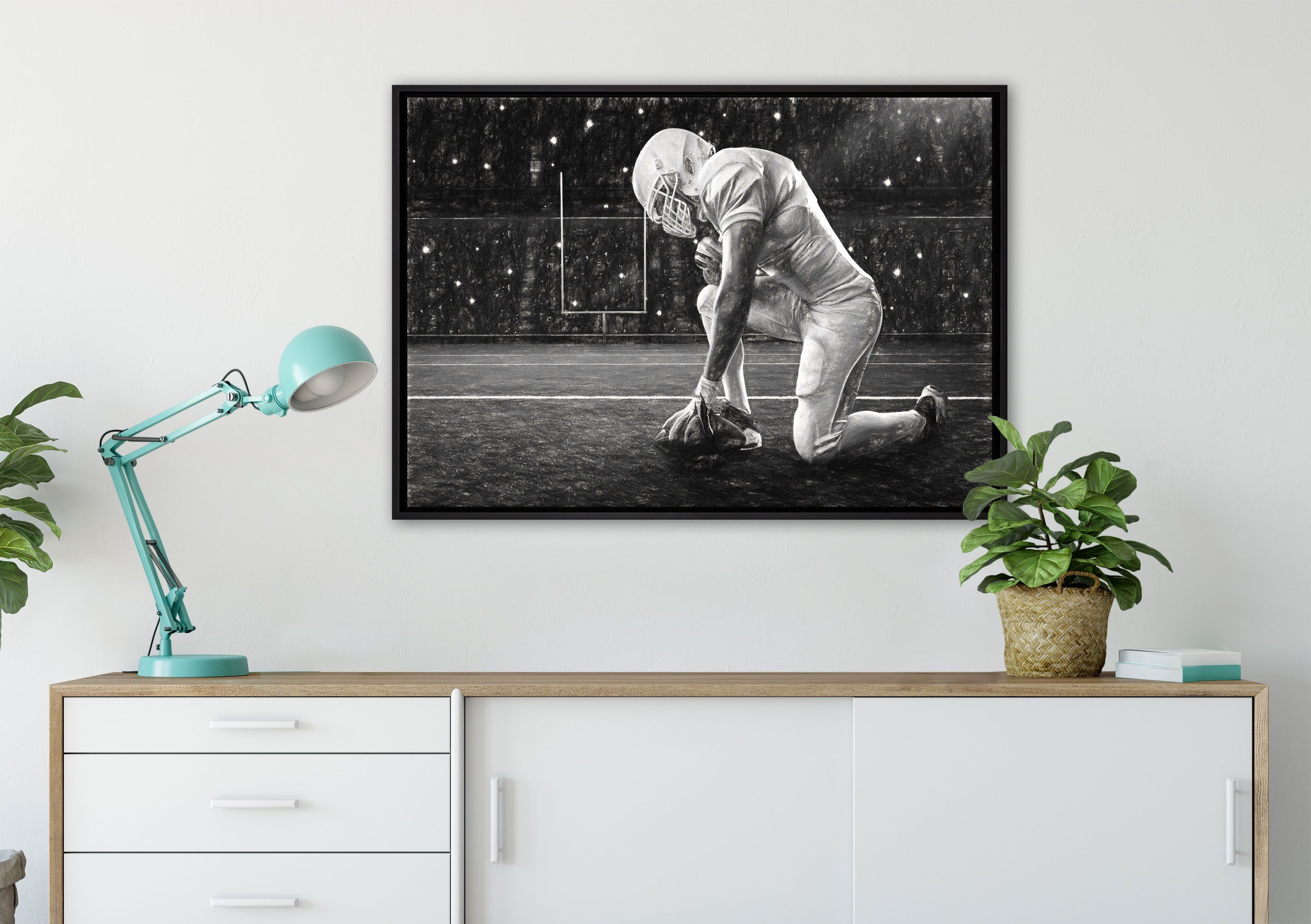 Pixxprint inkl. Football-Spieler St), Zackenaufhänger Wanddekoration Leinwandbild Kunst, in bespannt, gefasst, (1 einem knieender Leinwandbild Schattenfugen-Bilderrahmen fertig