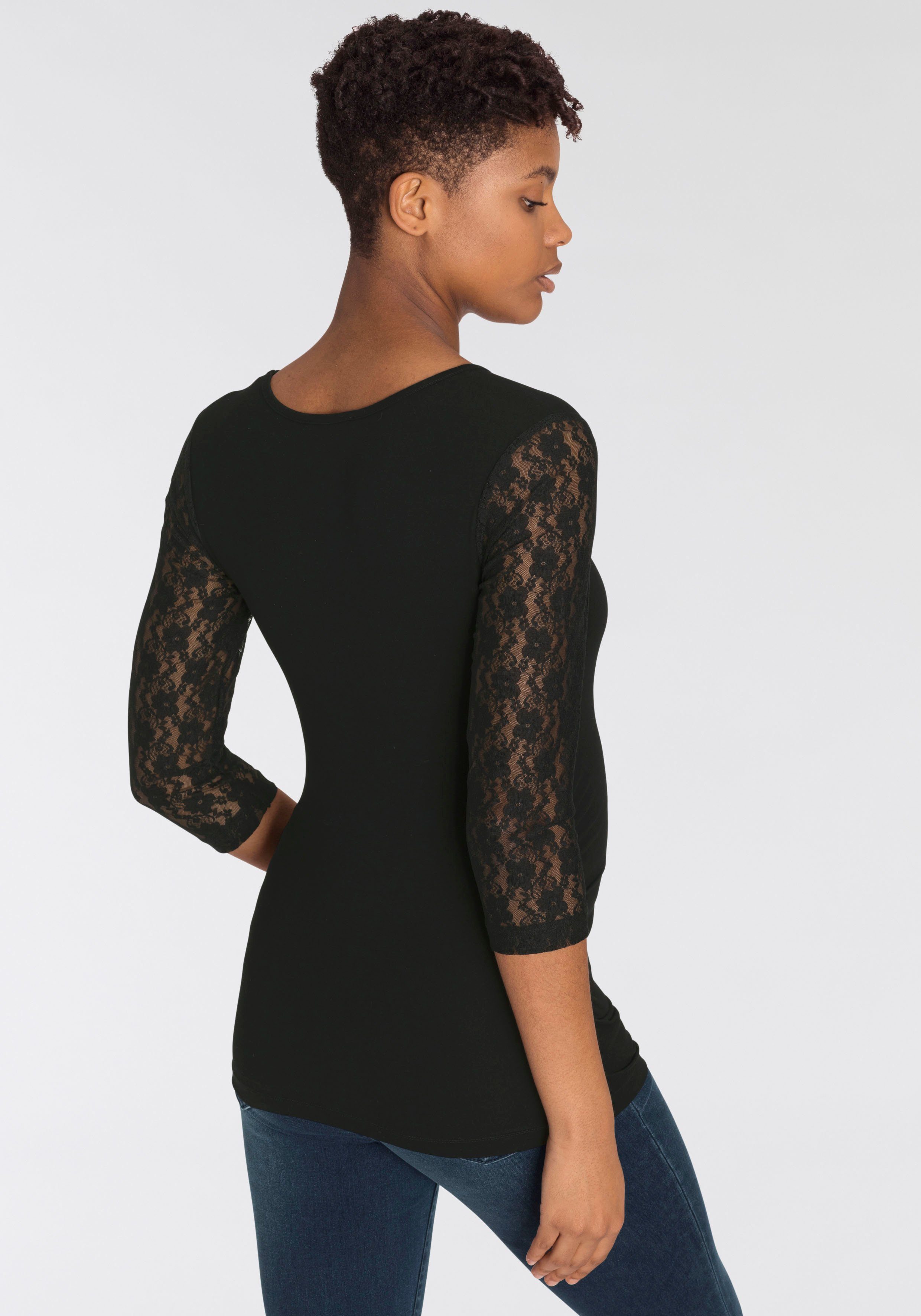 Nine-month maternity shirt, figure-hugging cut for pregnancy and breastfeeding, hip-length fit, round neck