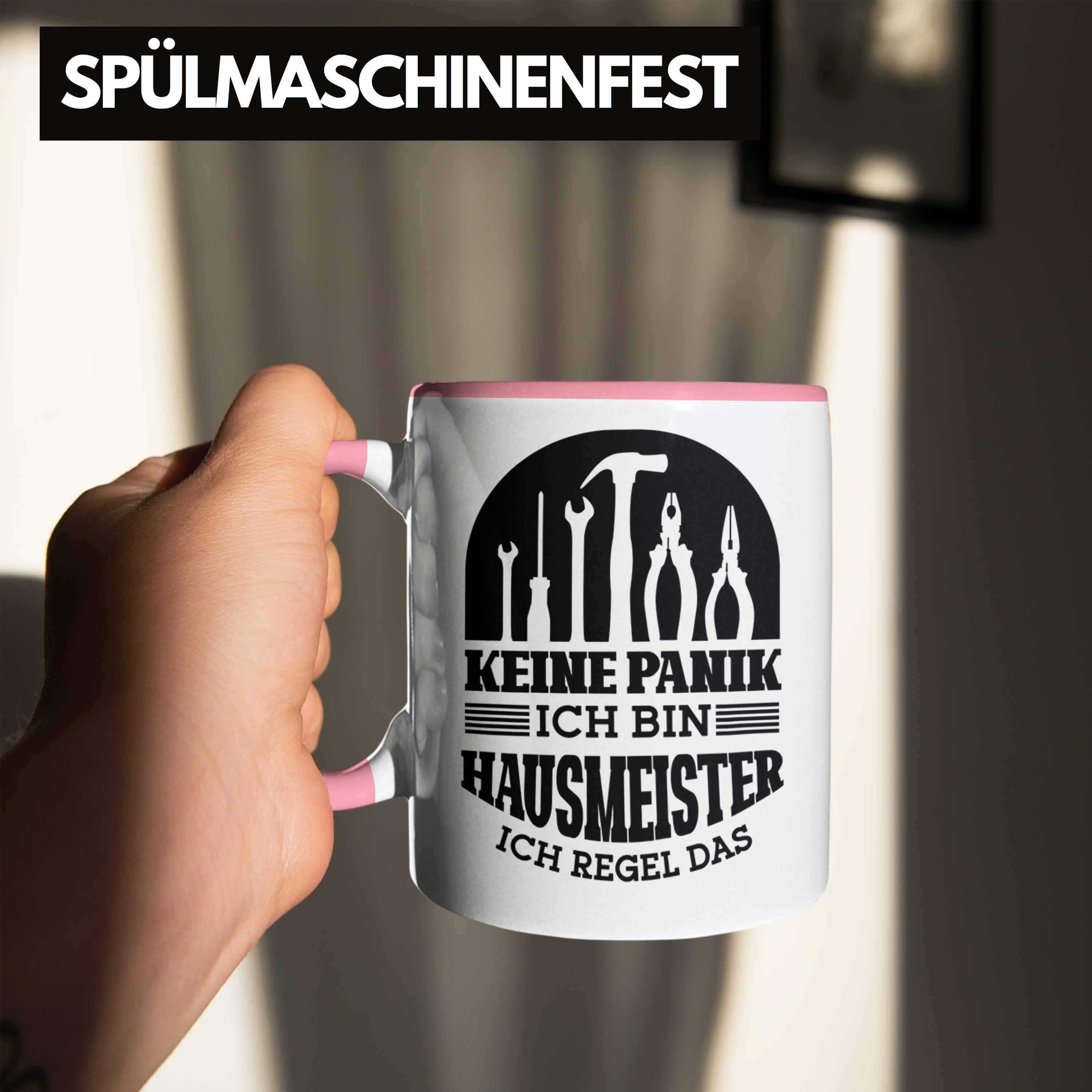 Trendation Tasse Lustiger Tasse Hausmeister Geschenk Geschenkidee Spruch Hausmeiste Rosa für