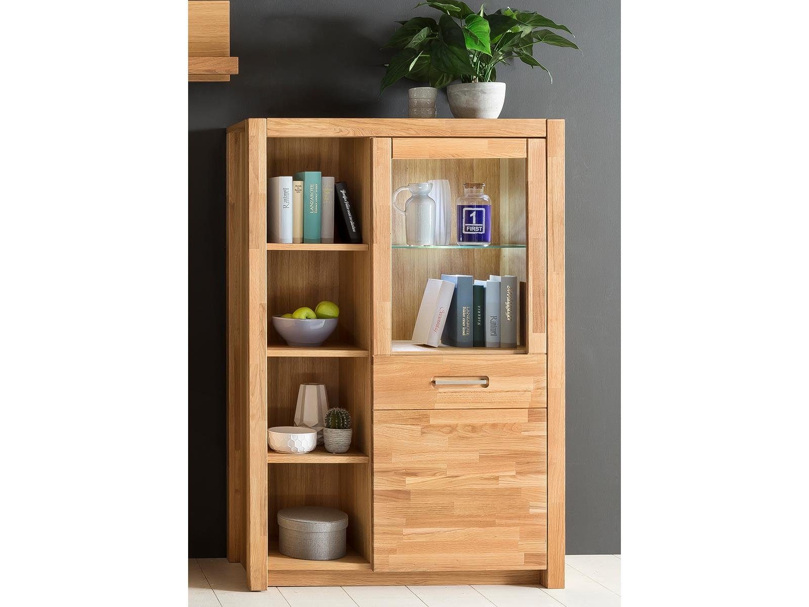 möbelando Highboard Leduc, Zeitloses Highboard mit 4 offenen Fächer und 1 Holz.-Glastür, Front in Wildeiche keilverzinkt Massiv geölt, Rahmentür in Wildeiche keilverzinkt Massiv geölt mit Klarglas, Korpus aus Spanplatte in Wildeiche: außen & innen furniert, Metallgriffe, Schubkastenführung, inkl. Beleuchtung. Breite 98 cm, Höhe 145 cm, Tiefe 40 cm