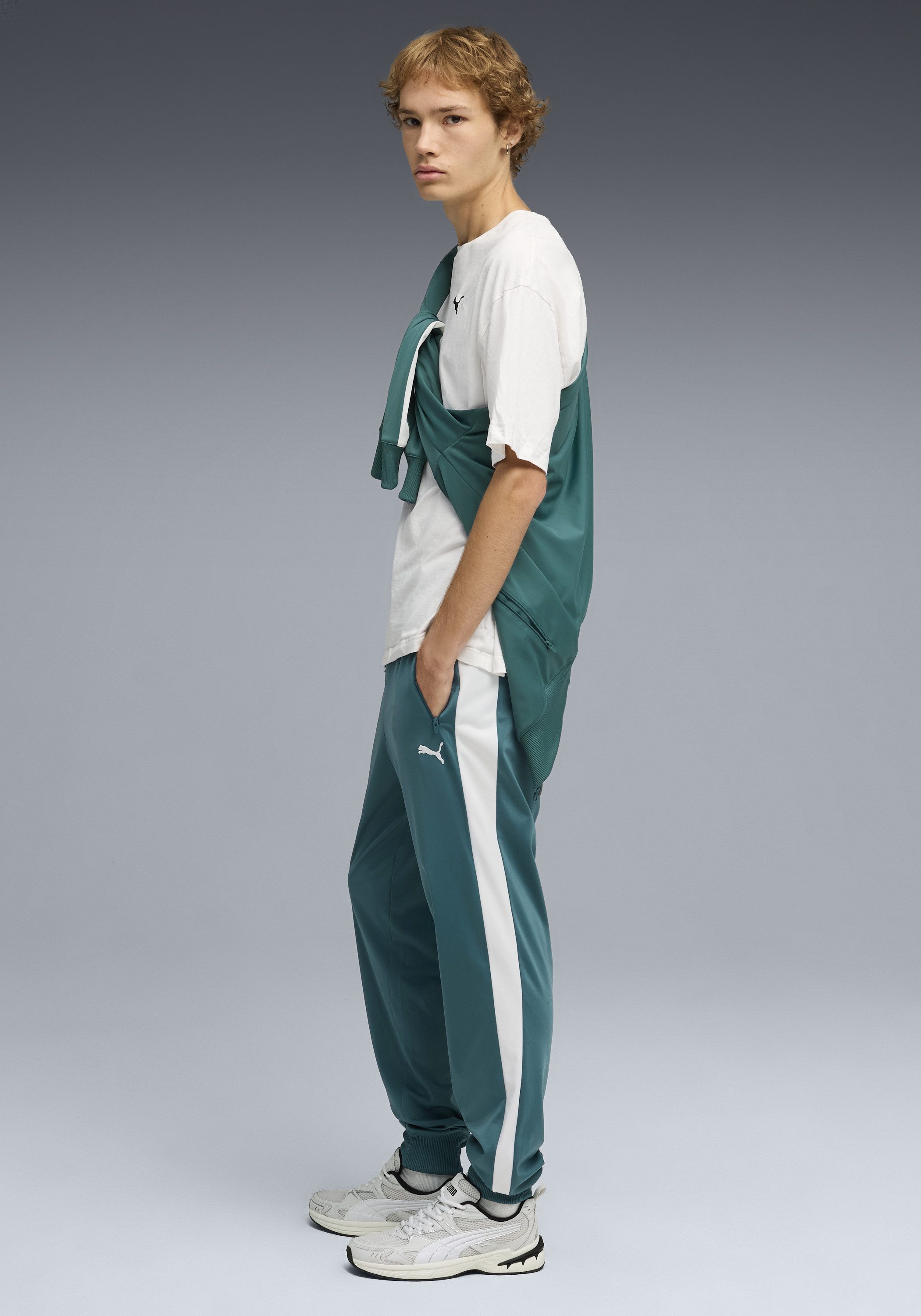 PUMA Trainingshose T7 FOUNDATION CL POLY KNITTED PANTS mit Eingrifftaschen, Regular Fit, sportlicher Stil