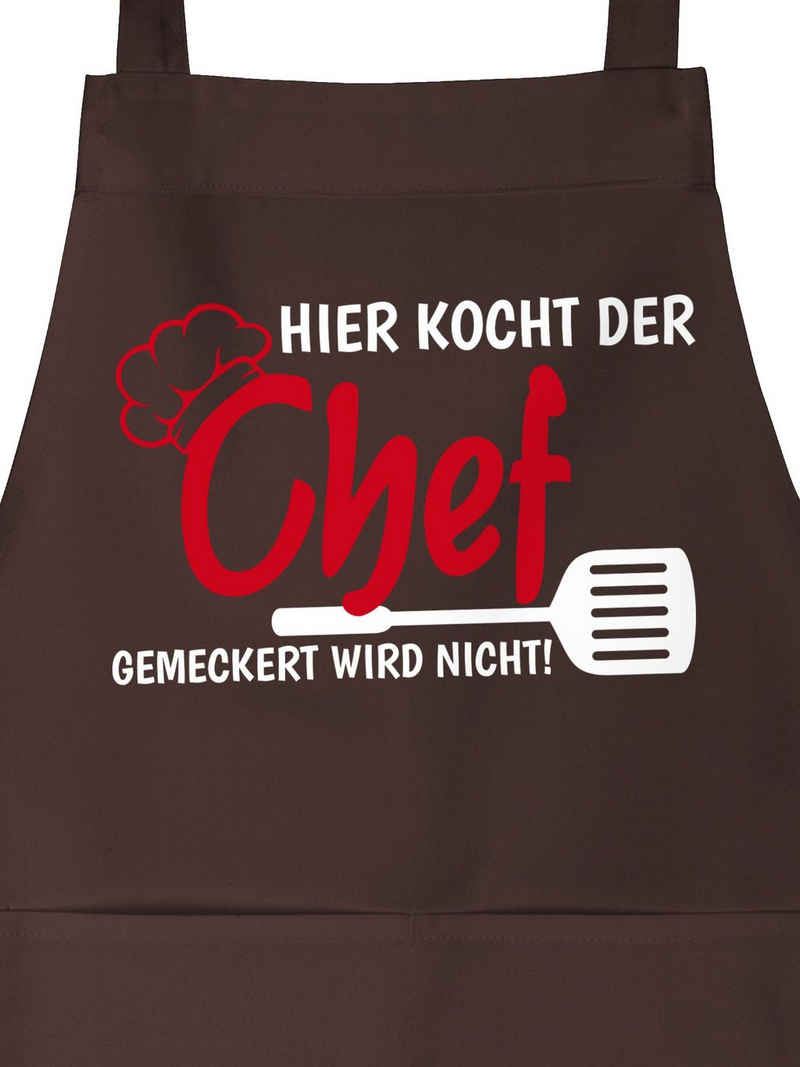 Shirtracer Kochschürze »Hier kocht der Chef gemeckert wird nicht - Küchenschürze zum Kochen - Kochschürze«, (1-tlg), schürze chefköchin - hier kocht der chef - männerschürzen kochen