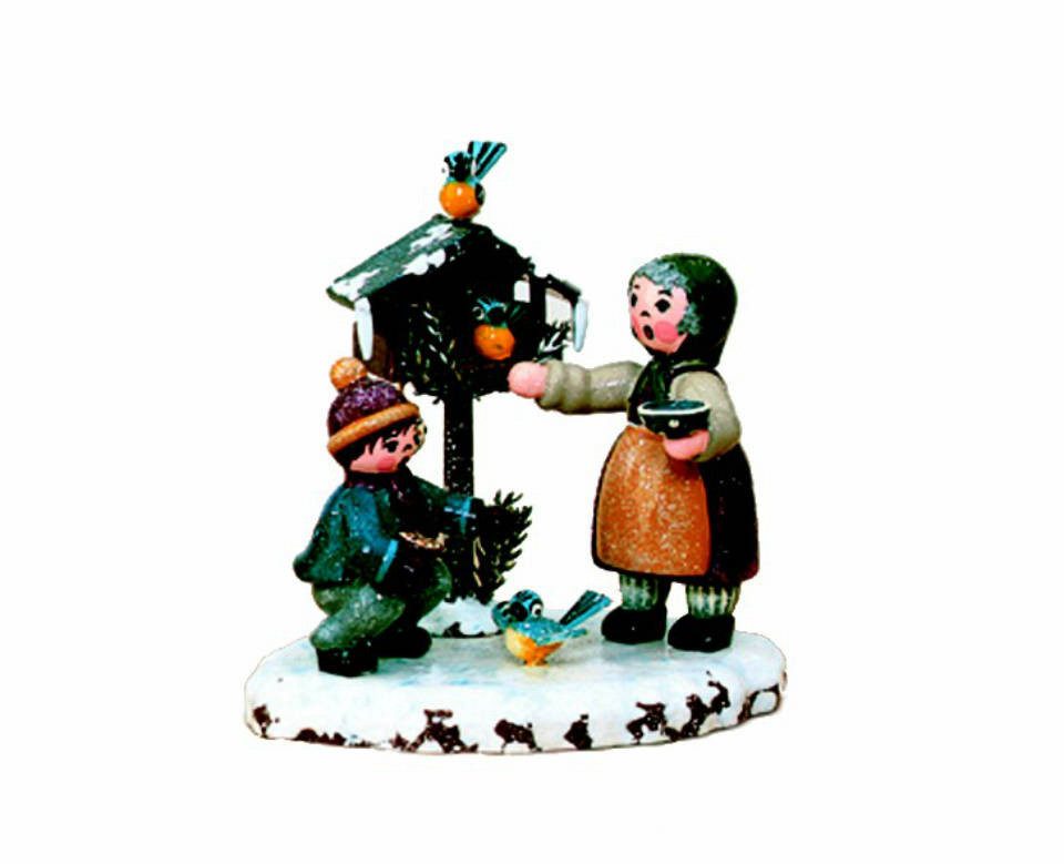 Hubrig Volkskunst Zschorlau Erzgebirge Sammelfigur Hubrig Winterkinder Vogelfütterung