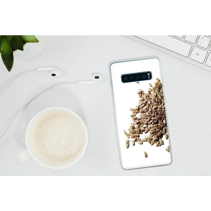 MuchoWow Handyhülle Stapel gerösteter Sonnenblumenkerne auf einem weißen Hintergrund Phone Case Handyhülle Samsung Galaxy S10+ Silikon Schutzhülle FN11636