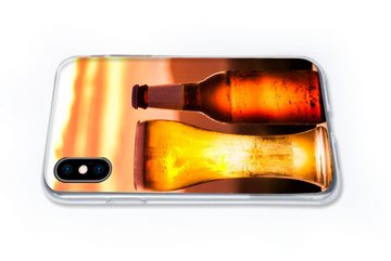 MuchoWow Handyhülle Bier bei Sonnenuntergang vor einer Bergkulisse, Handyhülle Apple iPhone Xs, Smartphone-Bumper, Print, Handy