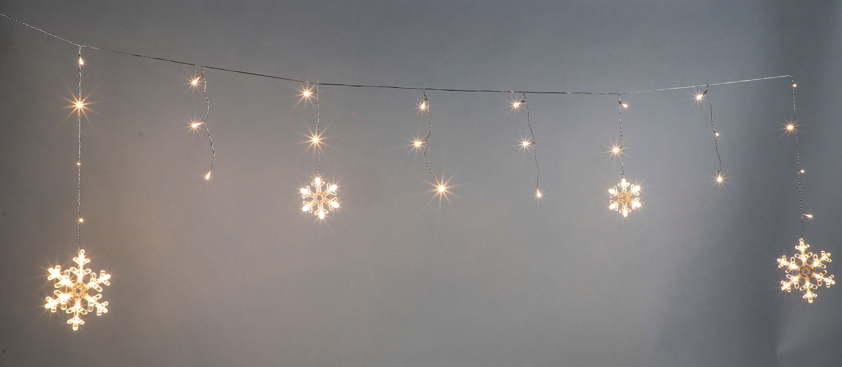 Spetebo Lichtervorhang LED Schneeflocken Lichtervorhang mit Timer - 210cm, 60-flammig, mit 60 warm weißen LED und Timer Funktion