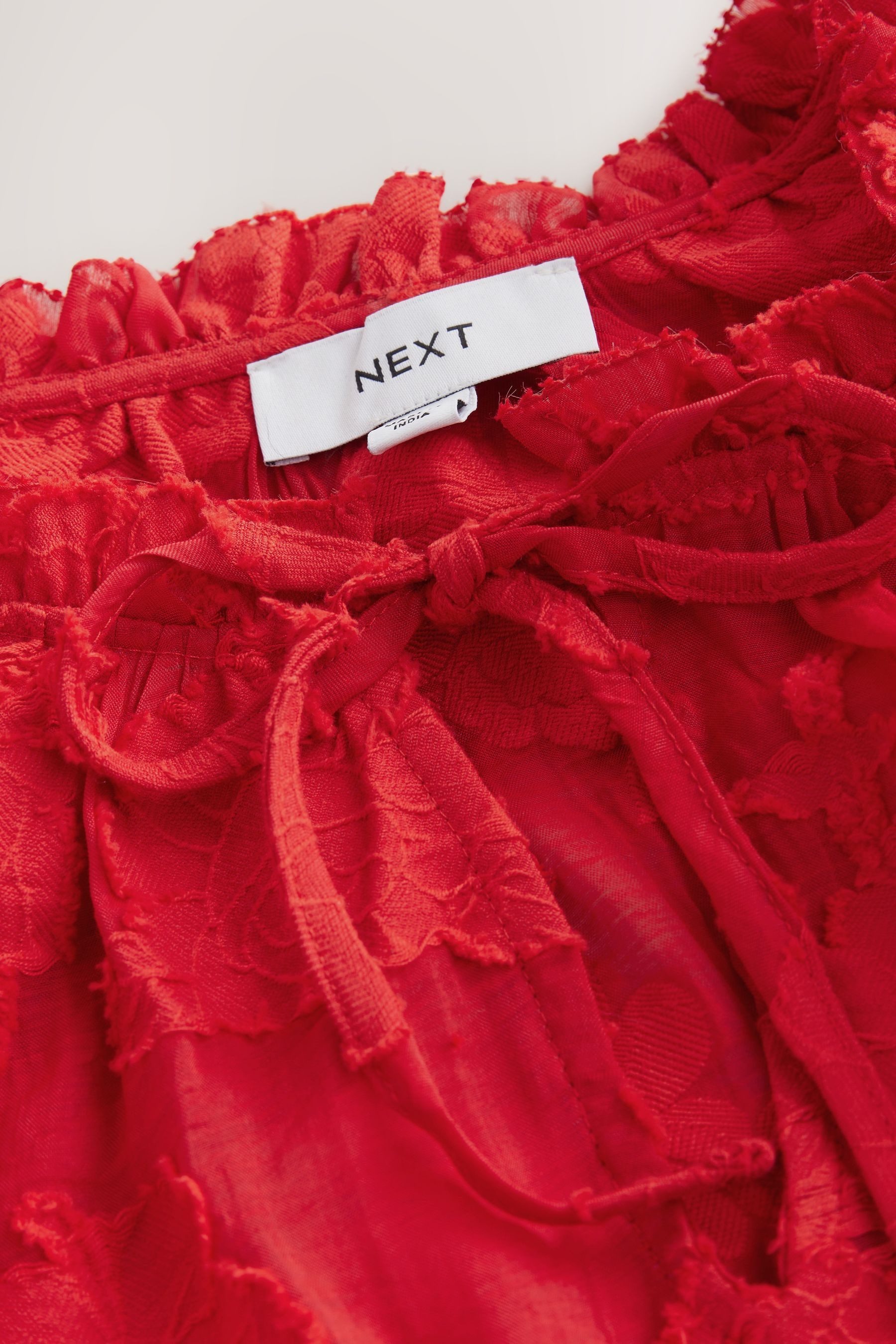 Next Langarmbluse Jacquard-Bluse mit Blumenmuster und Ballonsaum (1-tlg) günstig online kaufen