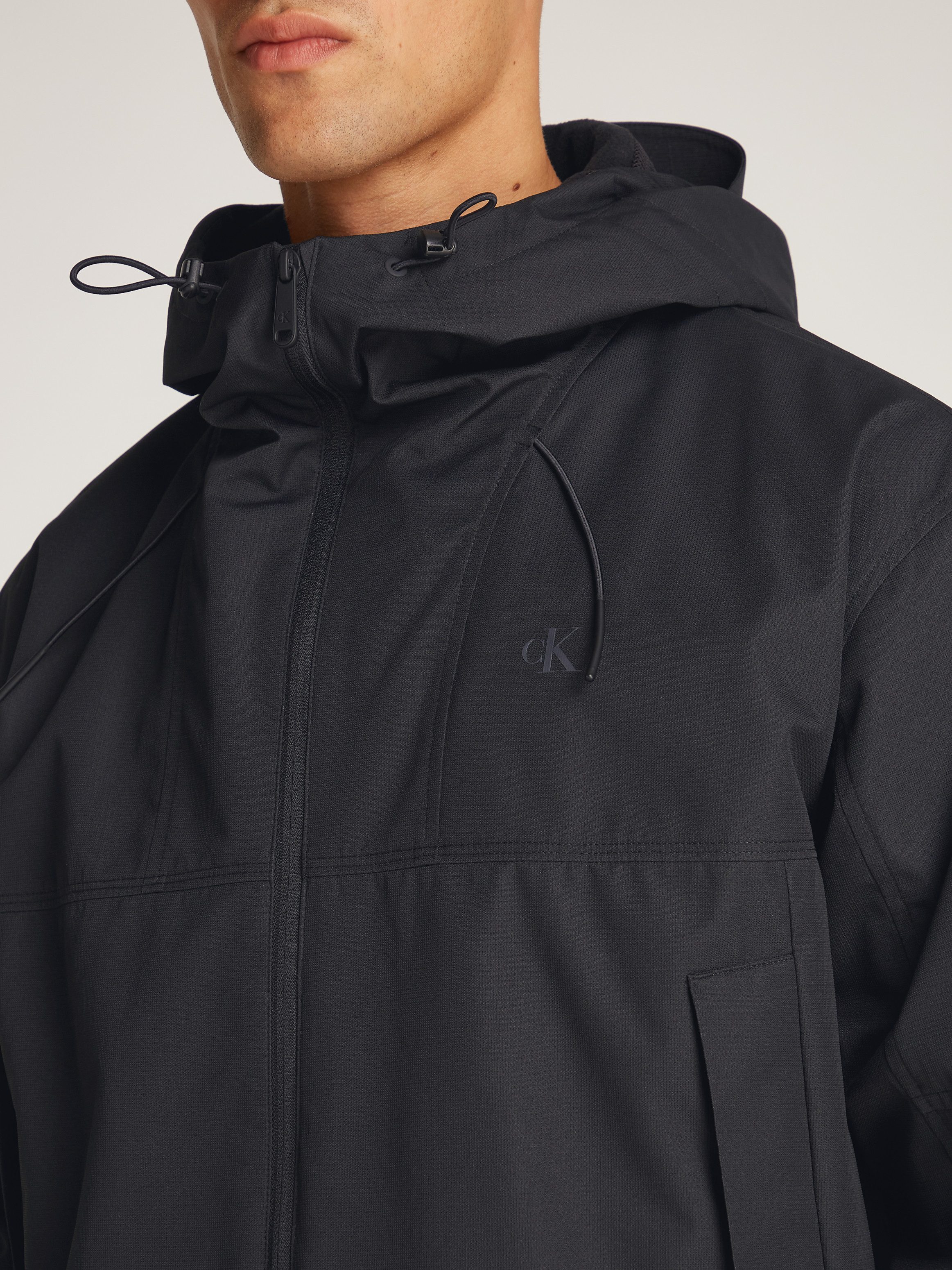 Calvin Klein Jeans Allwetterjacke TECHNICAL JACKET Logodruck, Eingriffstaschen