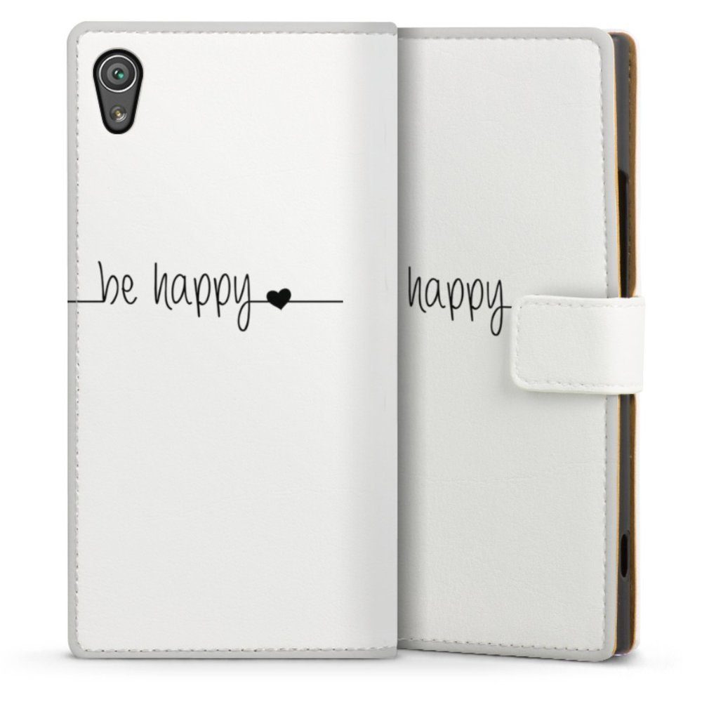 DeinDesign Handyhülle Statement Glück Motiv ohne Hintergrund be happy  transparent, Sony Xperia XA 1 Hülle Handy Flip Case Wallet Cover  Handytasche Leder
