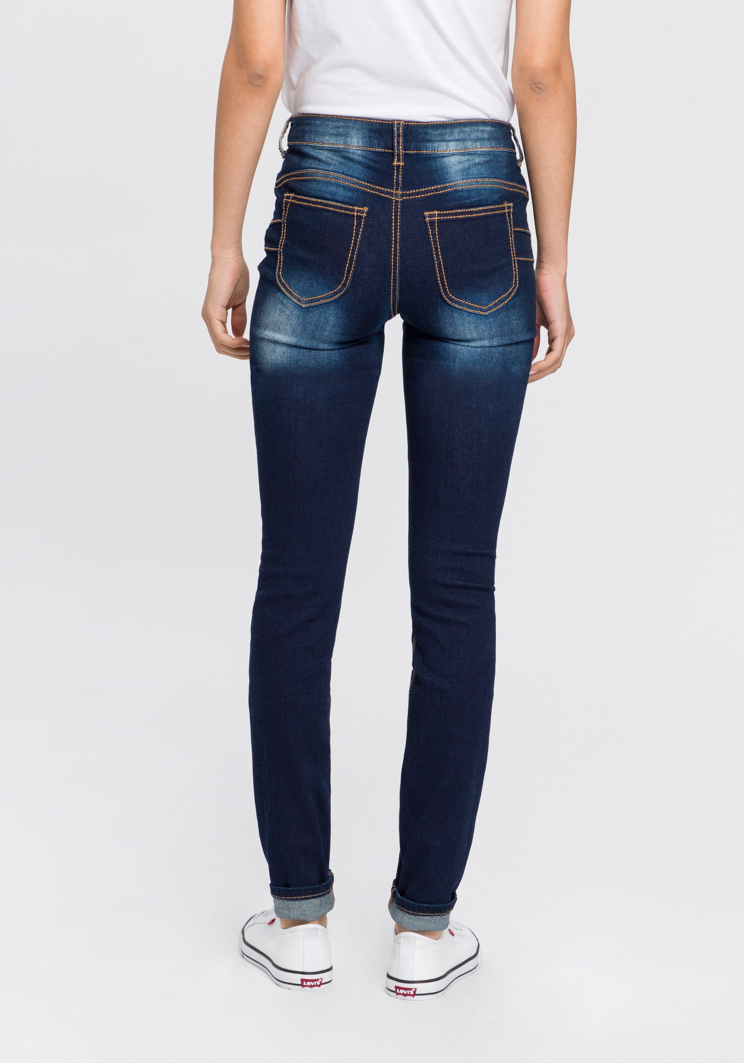 Arizona Slim-fit-Jeans »mit sichtbarer, schräger Knopfleiste« Mid Waist