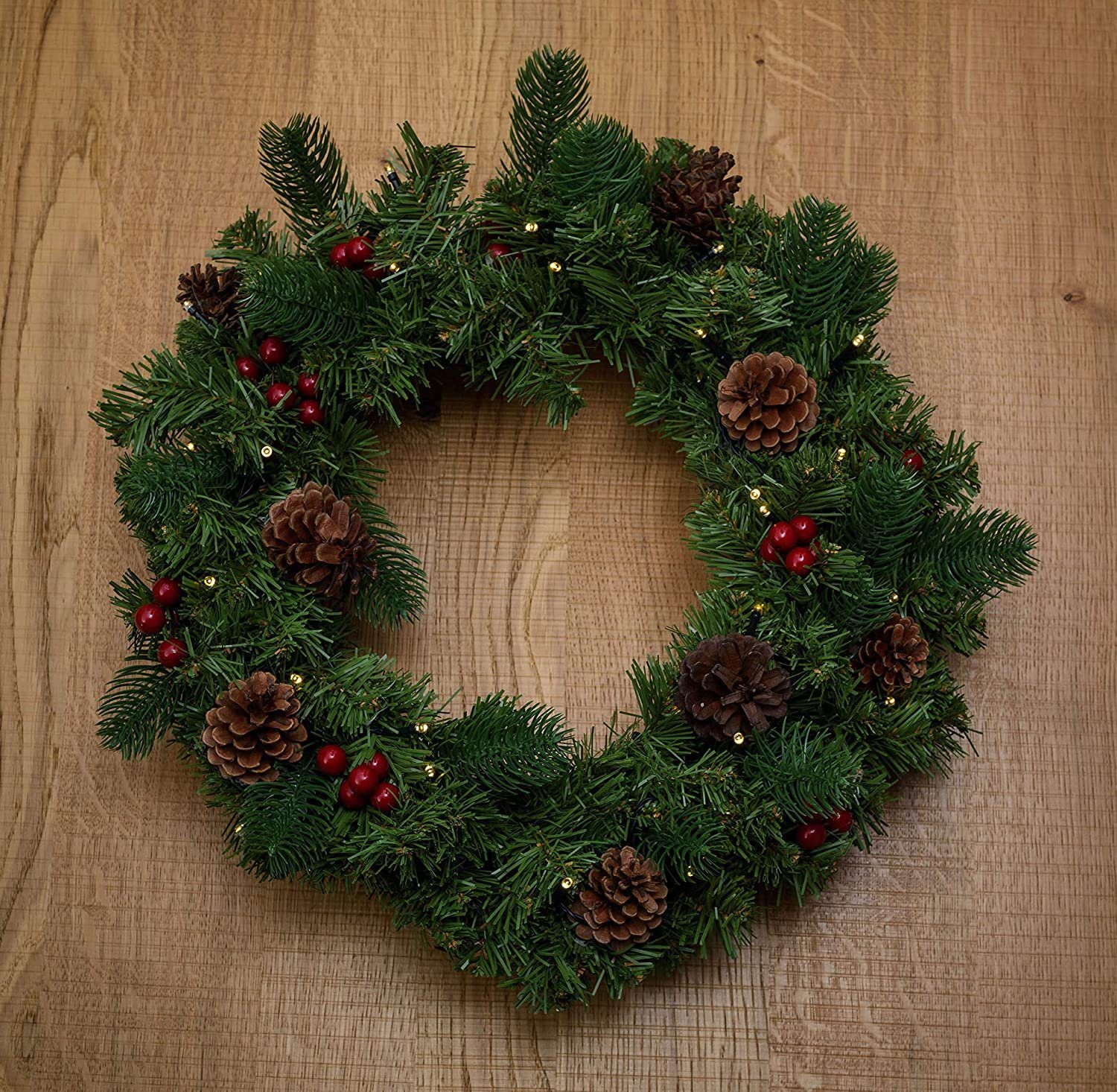 BONETTI Adventskranz Künstlicher Adventskranz mit Lichterkette und 4 LED Kerzen, batteriebetrieben, Ø 40cm, Tannenkranz mit Zapfen, Beeren, flammenlos