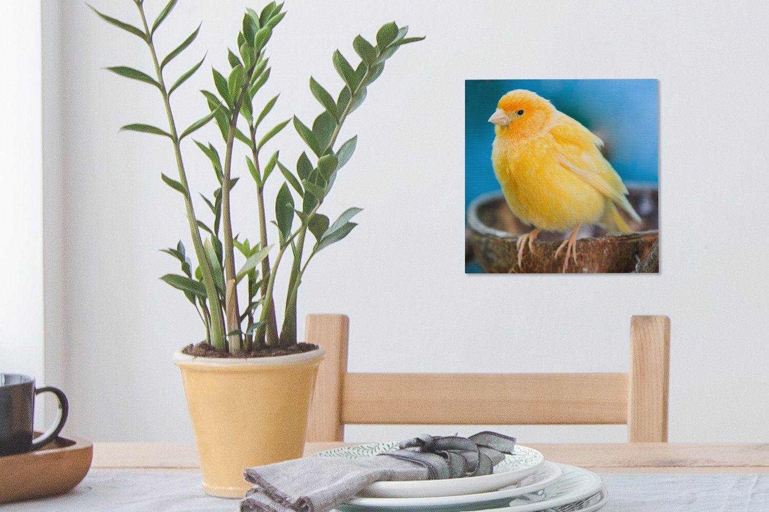 OneMillionCanvasses® Leinwandbild Leuchtend europäischer gelber Leinwand (1 Schlafzimmer Wohnzimmer seinem sitzt, Nest bei Kanarienvogel, Bilder für St), der