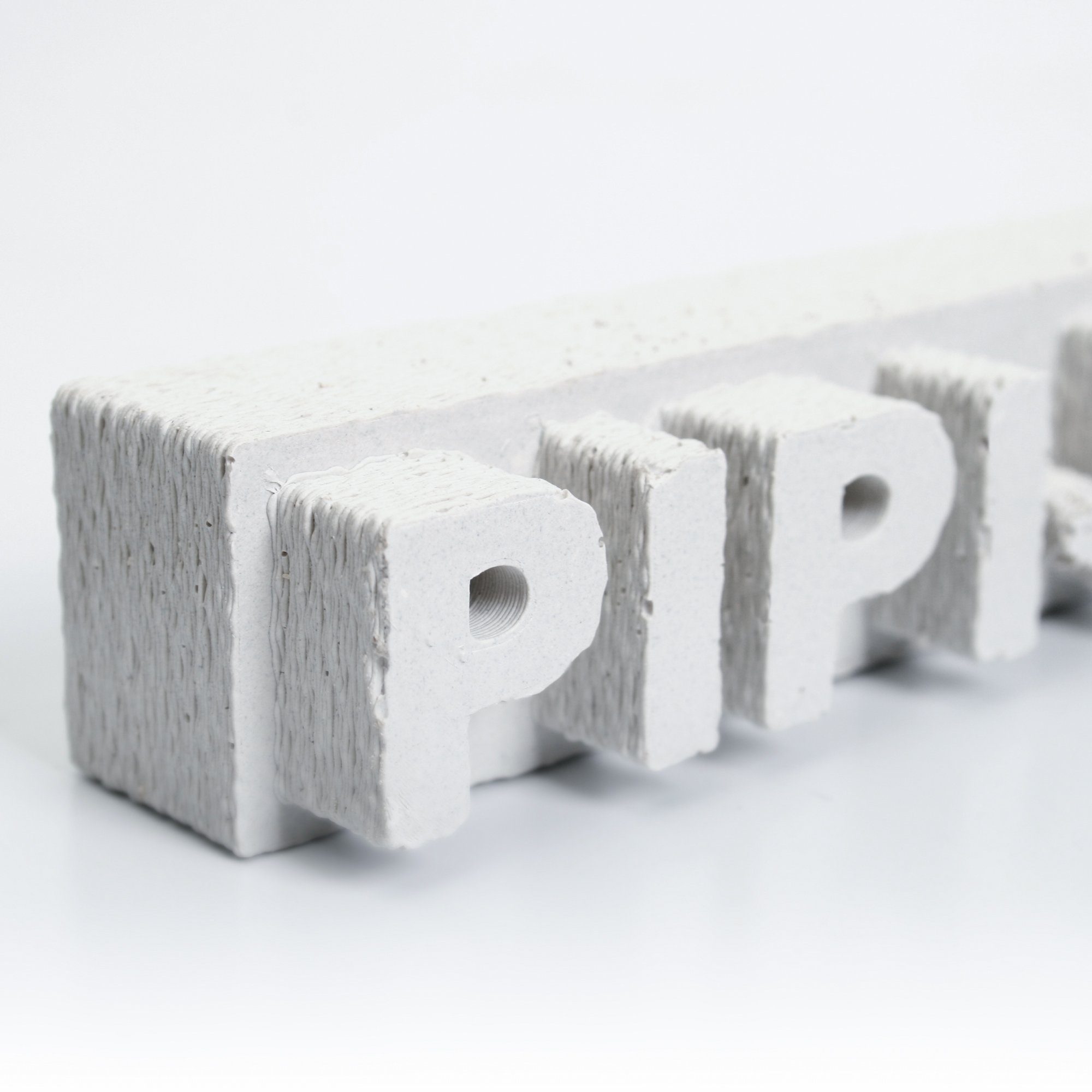Kreative Feder Deko-Schriftzug Dekorativer AUFSTELLER „PIPI-KAKA-LAND“ handgegossen aus Beton, jedes Einzelstück ein Unikat