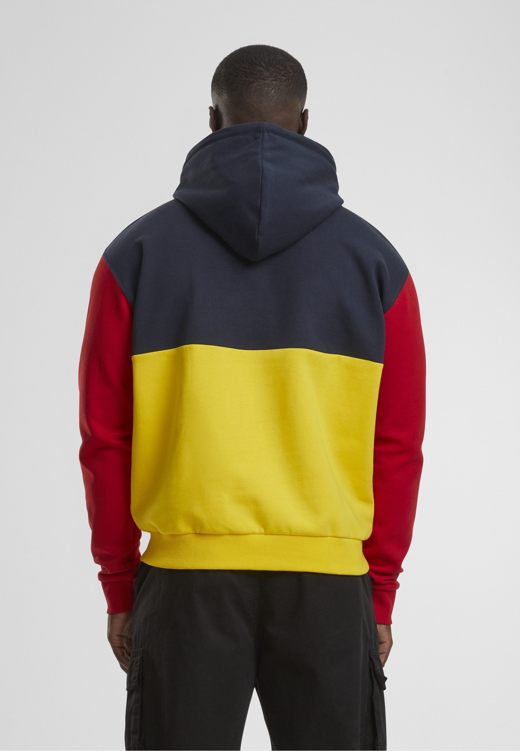 Karl Kani Kapuzensweatshirt Karl Kani Signature Block Teddy Hoodie yellow/navy/red (1-tlg)