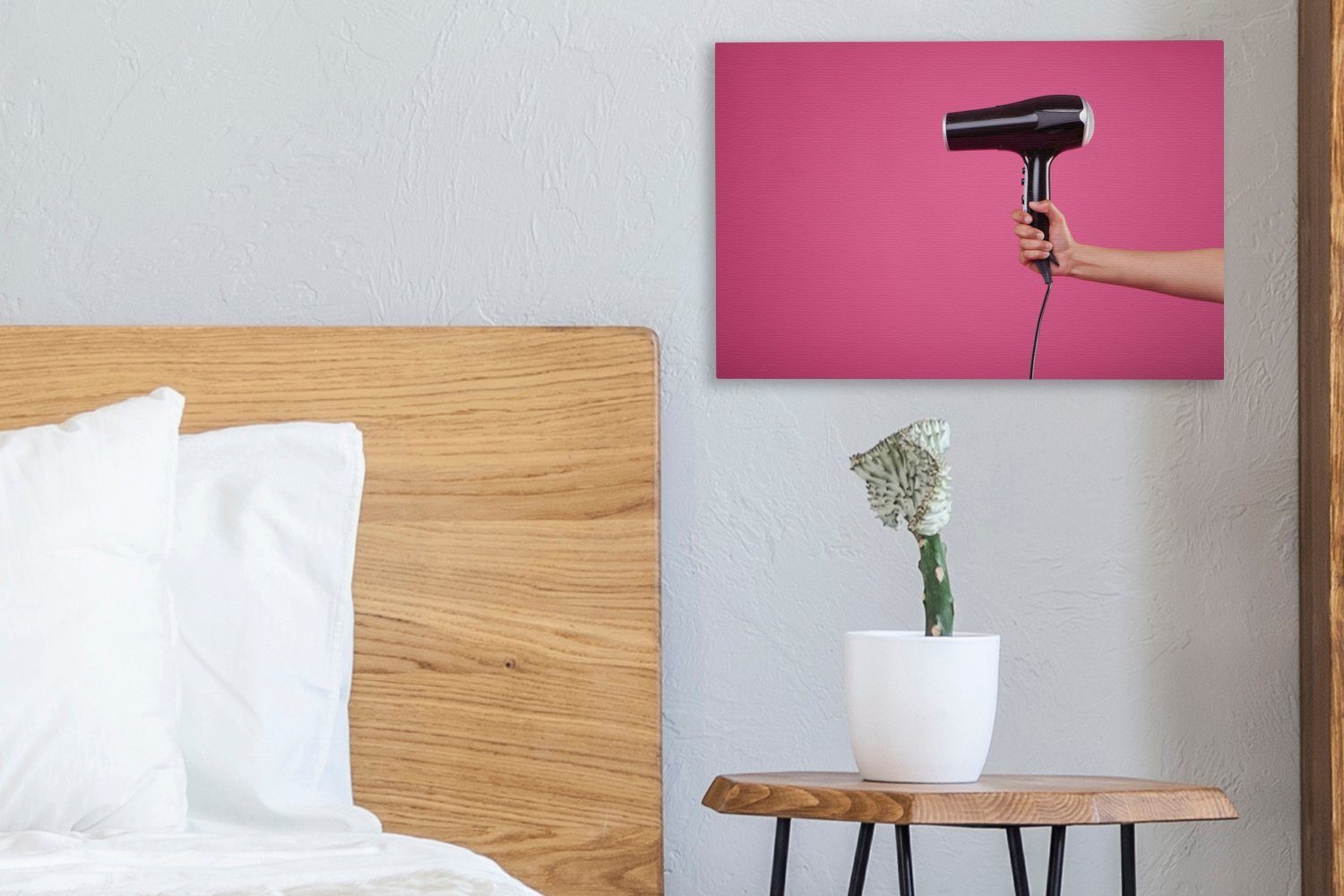 Ein auf Leinwandbild (1 St), cm rosa Aufhängefertig, 30x20 Wandbild Hintergrund, Haartrockner OneMillionCanvasses® Wanddeko, Leinwandbilder, einem schwarzer