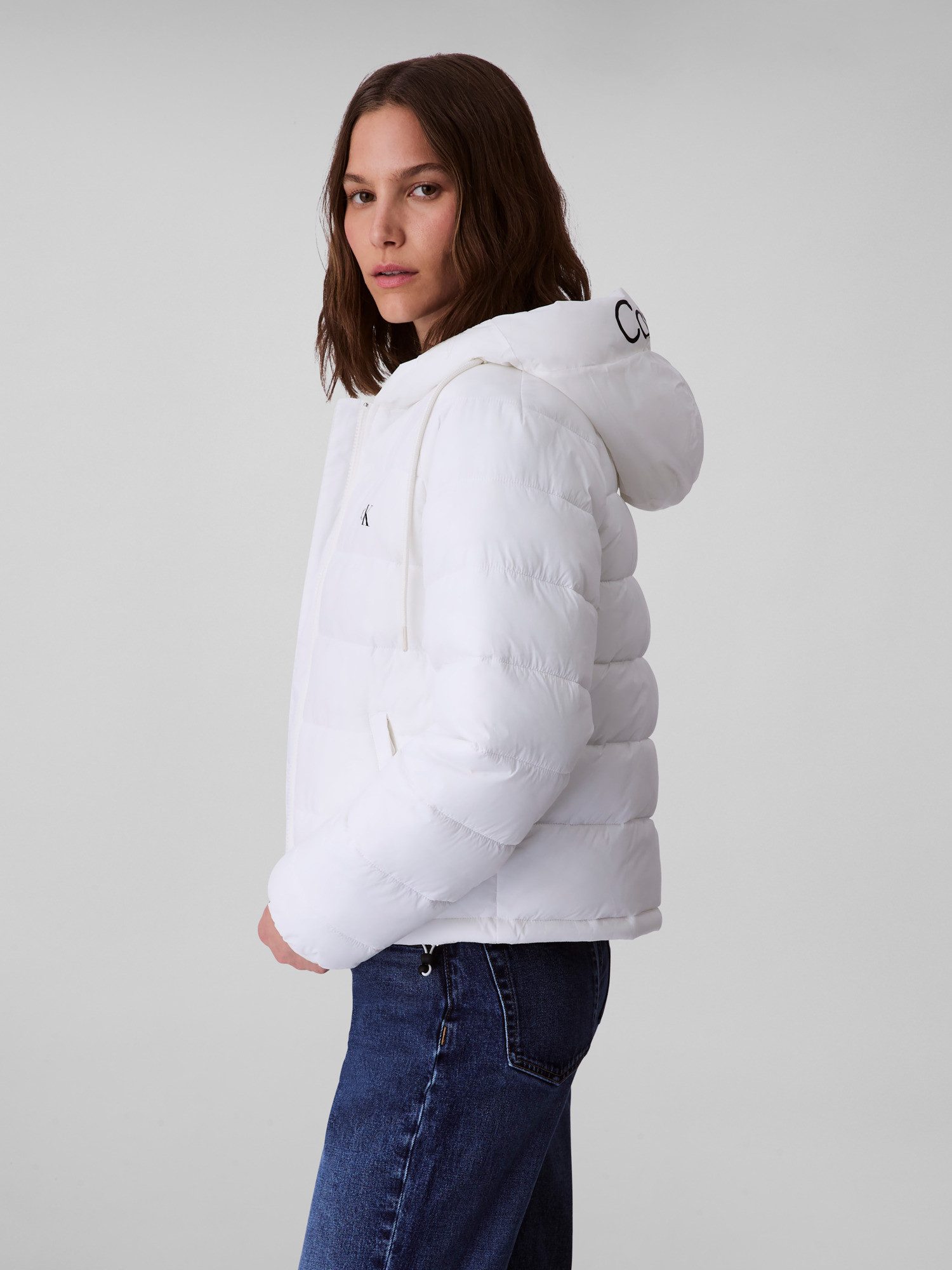 Calvin Klein Jeans Steppjacke LIGHTWEIGHT LOGO PUFFER Mit Logo an der Kaput günstig online kaufen