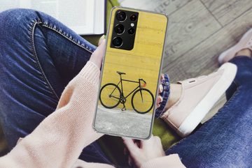 MuchoWow Handyhülle Ein Rennrad vor einem industriellen Hintergrund, Phone Case, Handyhülle Samsung Galaxy S21 Ultra, Silikon, Schutzhülle