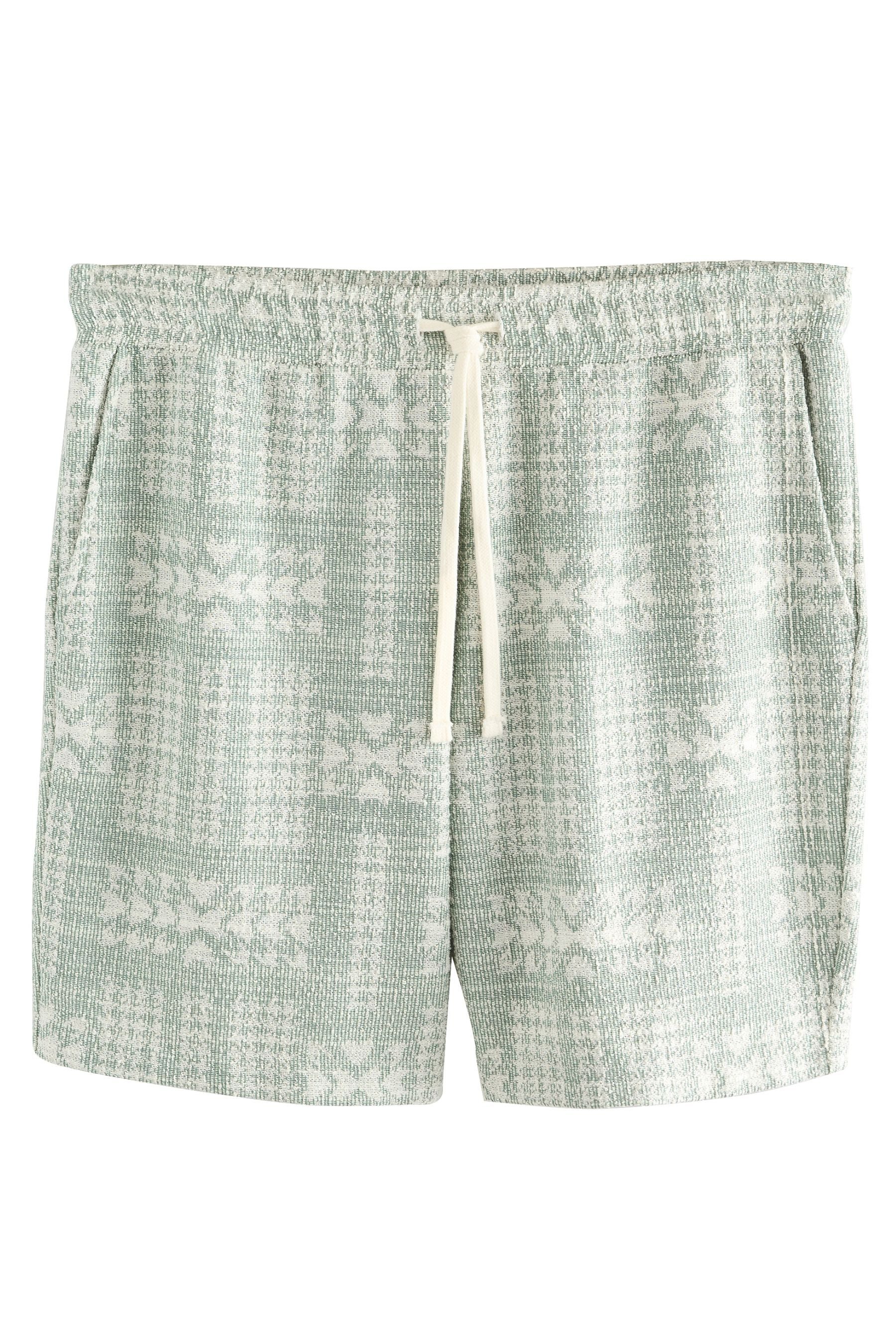 Sweatshorts Shorts aus strukturiertem Jersey im Geomuster