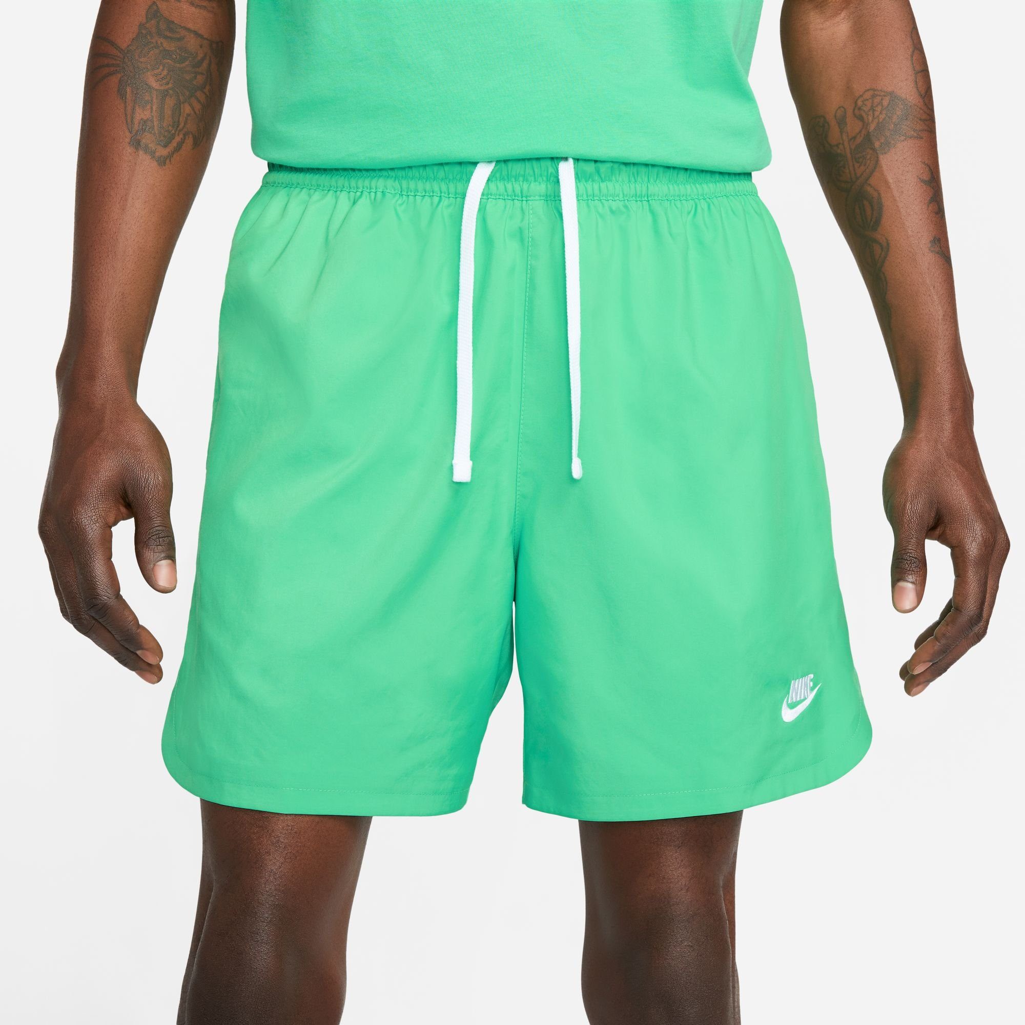 Nike Sportswear Shorts Sport Essentials Men's grün Woven Shorts Lined Flow