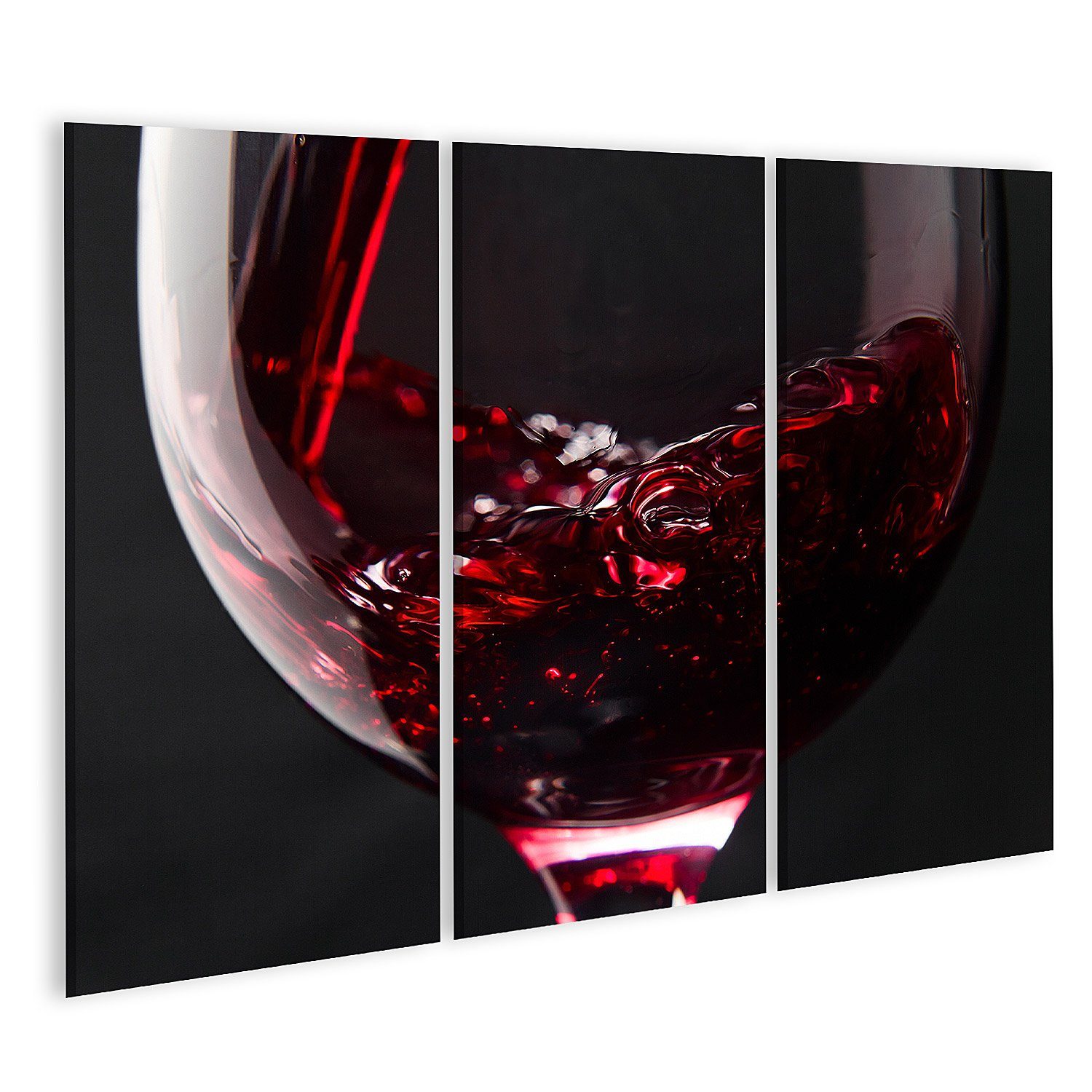 Leinwandbild Bild auf Leinwand Rotwein im Weinglas auf einem schwarzen Hintergrund