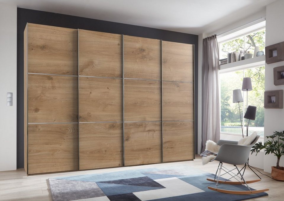 freiraum Schwebetürenschrank Escape (BxH: 350x216 cm) in PLANKENEICHE  NACHBILDUNG mit 4 Türen und 4 Einlegeböden, Gefertigt aus Spanplatte E05 in  Farbe PLANKENEICHE NACHBILDUNG