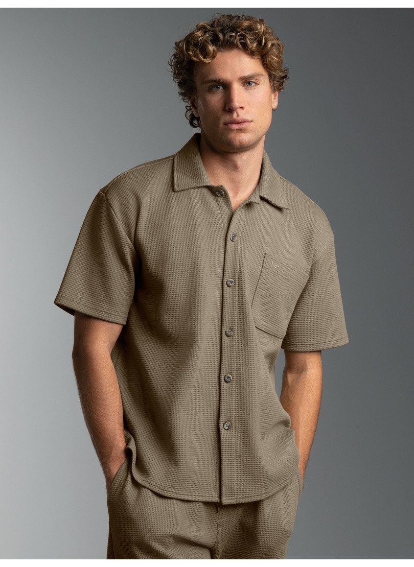 Trigema Blusenshirt TRIGEMA Polohemd in Waffel-Optik (1-tlg)