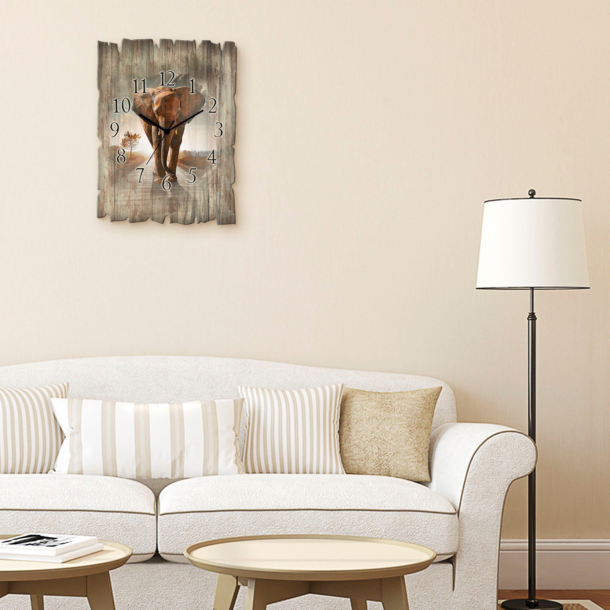 Artland Wanduhr Ein Elefant läuft auf günstig online kaufen