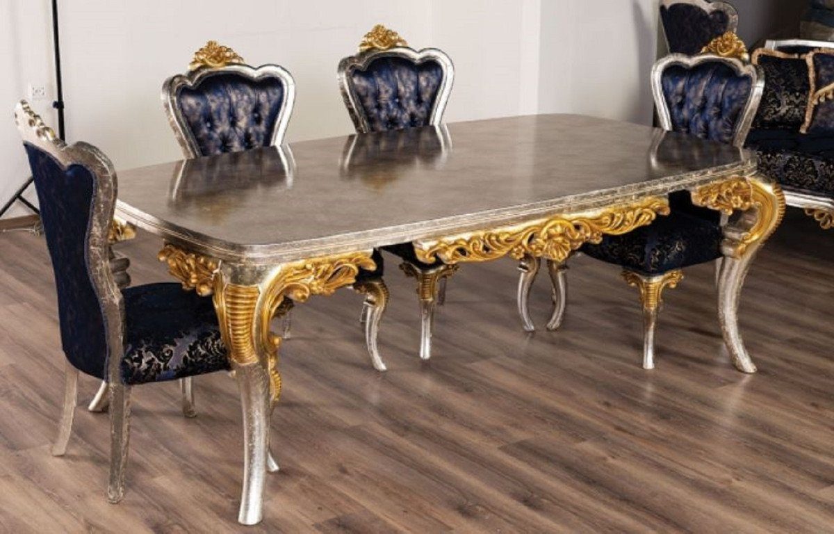 Casa Padrino Esstisch Luxus Barock Esstisch Silber / Gold - Handgefertigter Massivholz Esszimmertisch im Barockstil - Prunkvolle Barock Esszimmer Möbel