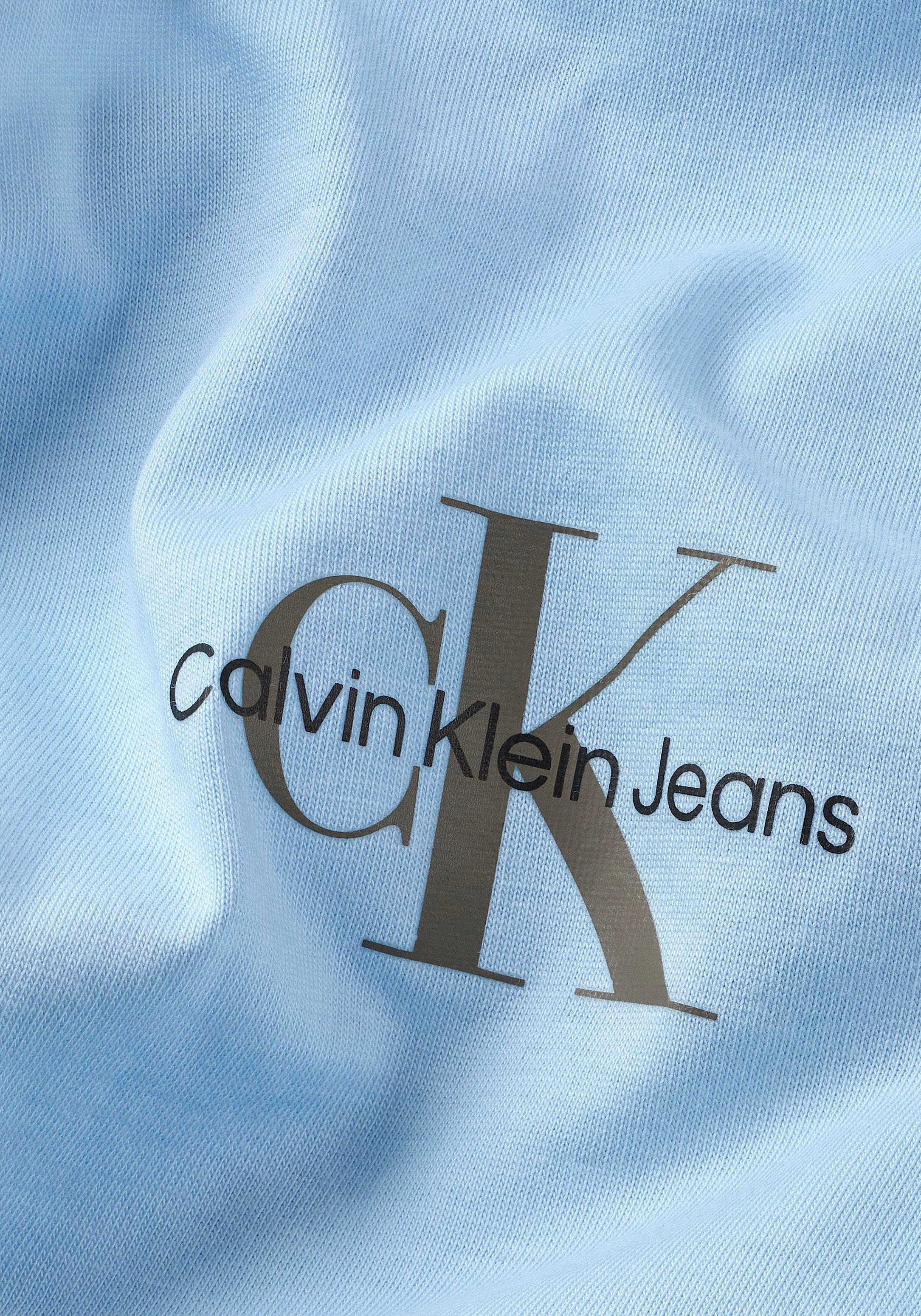 Rundhalsausschnitt Klein Calvin hellblau mit T-Shirt Jeans