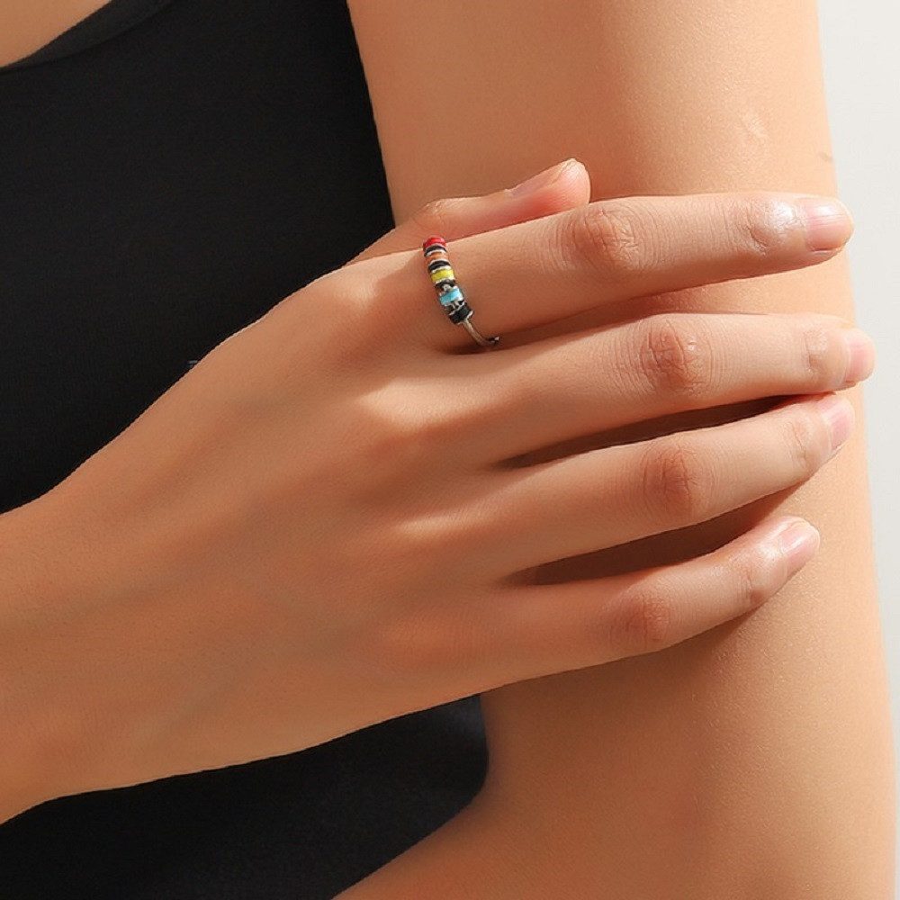 Eyecatcher Fingerring Anti Stress Ring bunte bewegliche Röllchen One Size günstig online kaufen