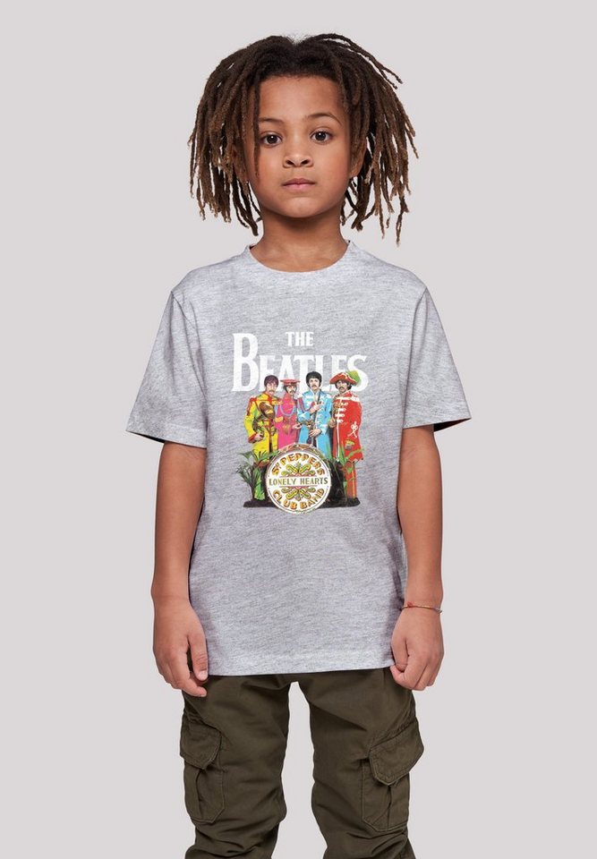 F4NT4STIC T-Shirt The Beatles Band Sgt Pepper Black Print, Das Model ist  145 cm groß und trägt Größe 145/152