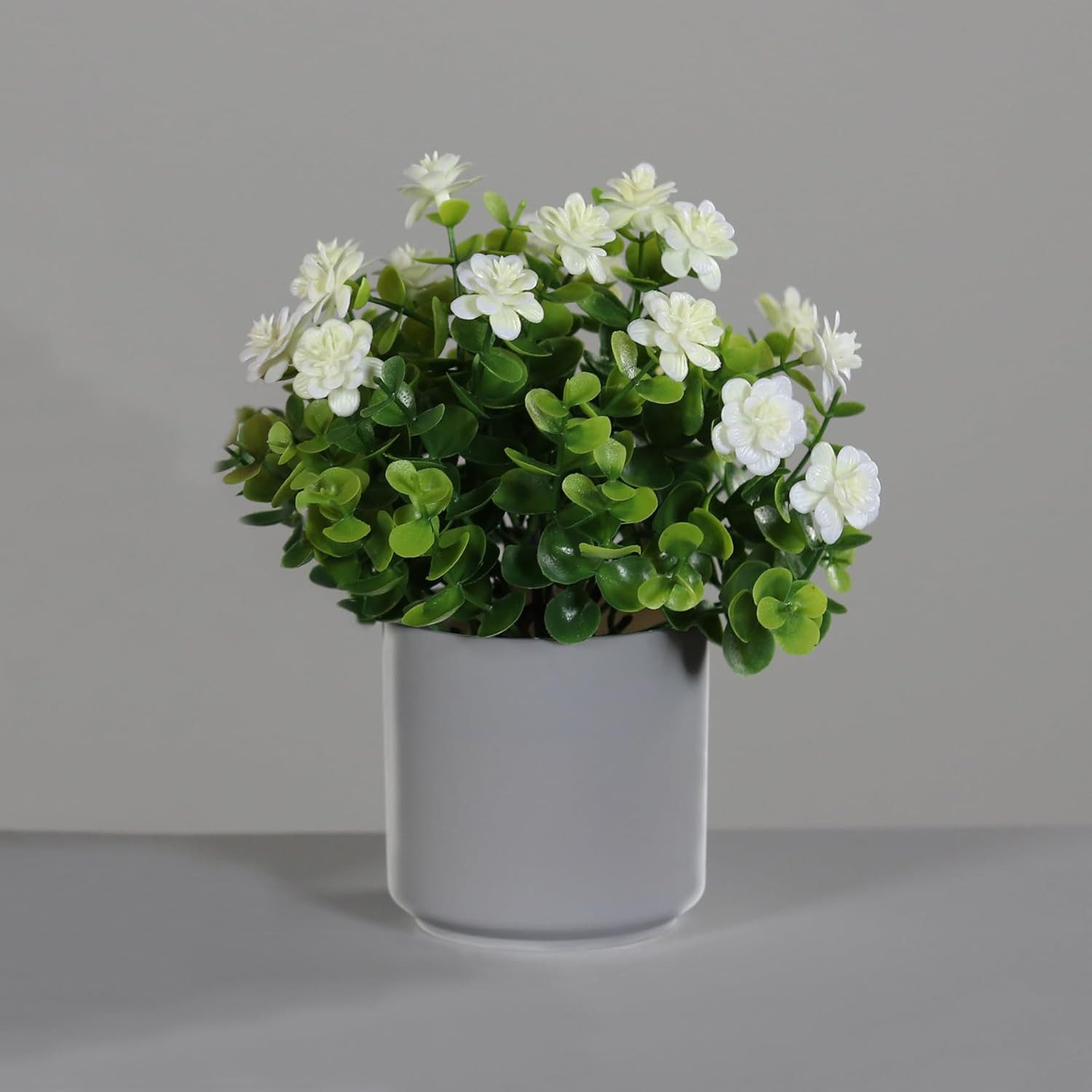 Kunstpflanze Blüten Arrangement Kamelie im grauen Kunstofftopf 21cm, mucPlants