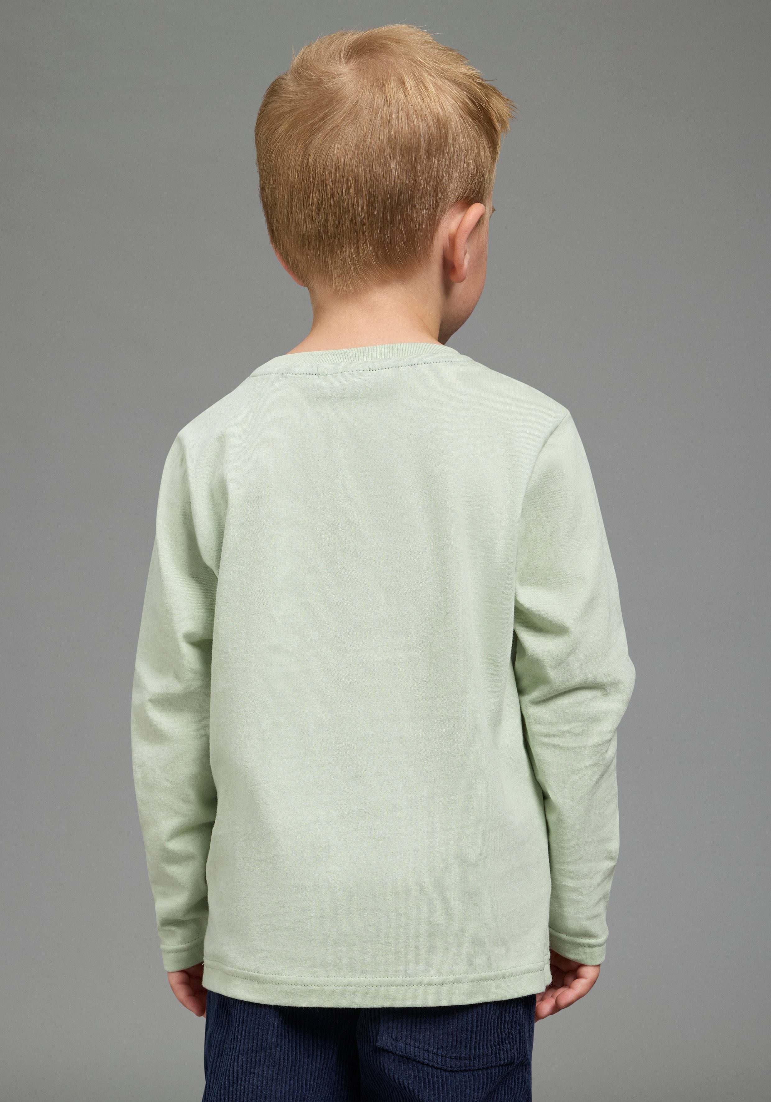 KIDSWORLD Langarmshirt Shirt mit großer Traktor Frottee-Applikation hüftlange Basic-Passform, Langarm, modischer Stil