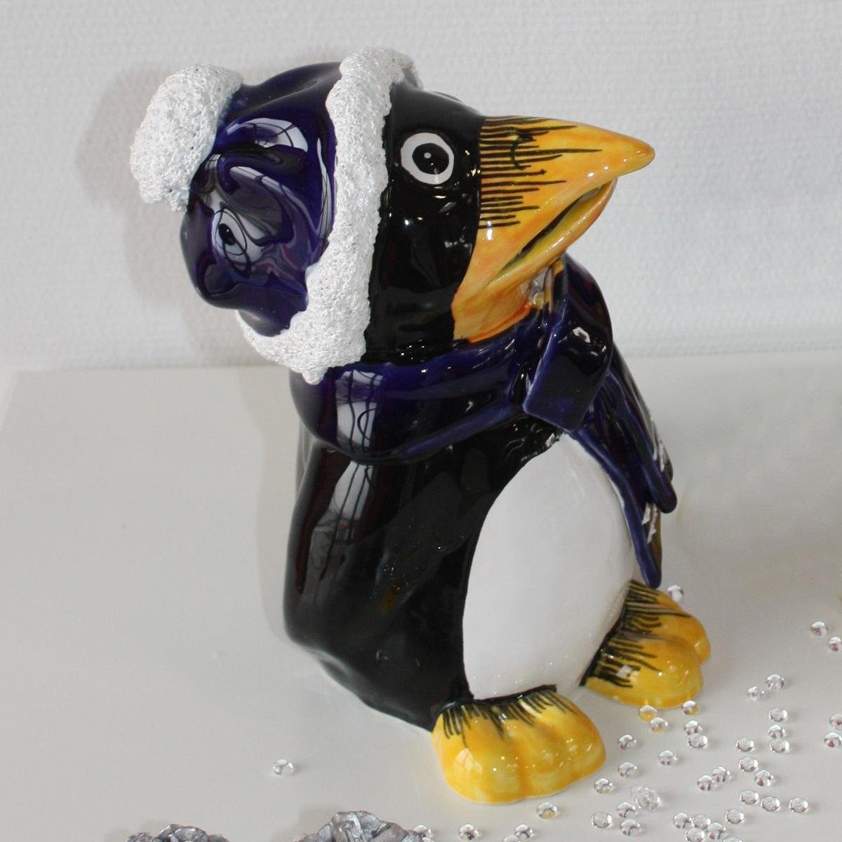 und (Stück) blauem Keramik-Pinguin Gartenfigur Tangoo Tangoo mit Schal Mütze,