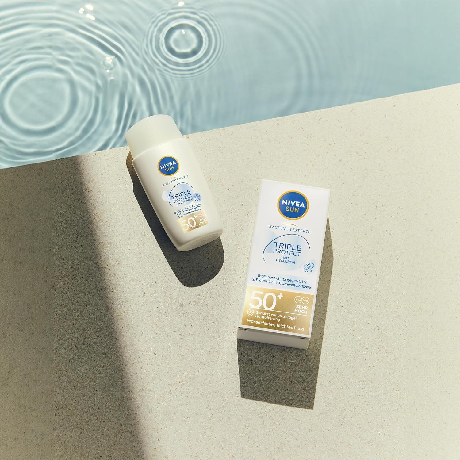 Nivea Sun Sonnenschutzcreme Triple Protect Sonnenfluid SPF 50+ – Ultra-leichter Schutz vor UV, Blue Light & Umwelteinflüssen – 40 ml, leicht, schnell einziehend, umweltfreundlich, dreifacher Schutz, wasserfest, antioxidativ, schweißresistent
